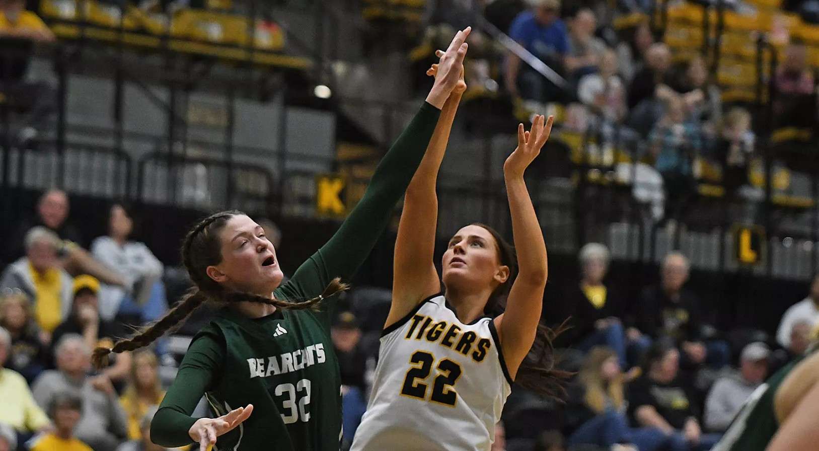 Fort Hays State's Talexa Weeter (22) attempts a shot over Northwest MIssouri State's Sadie Maas (32) on Thursday, January 1, 2026 in Hays, Kan. (FHSU Athletics photo/Nicole Heitmen)