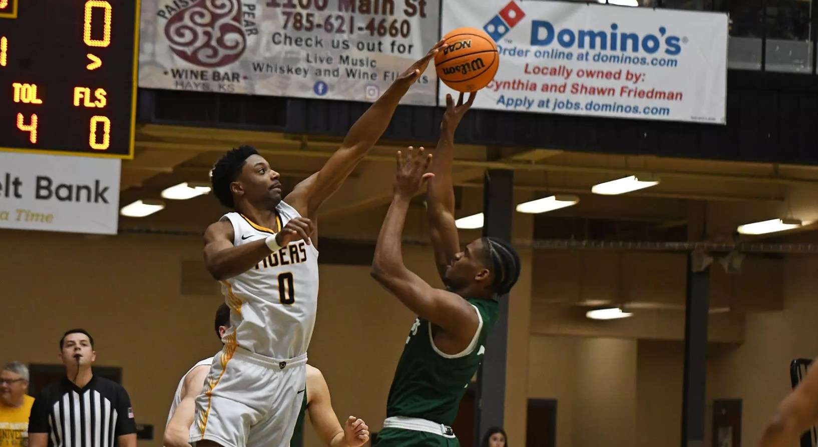 Fort Hays State's Dan Makuna (0) blocks the shot of Northwest Missouri State's  Mathew Mayes (3) on Thursday, January 1, 2026 in Hays, Kan. (FHSU Athletics photo/Nicole Heitmann)