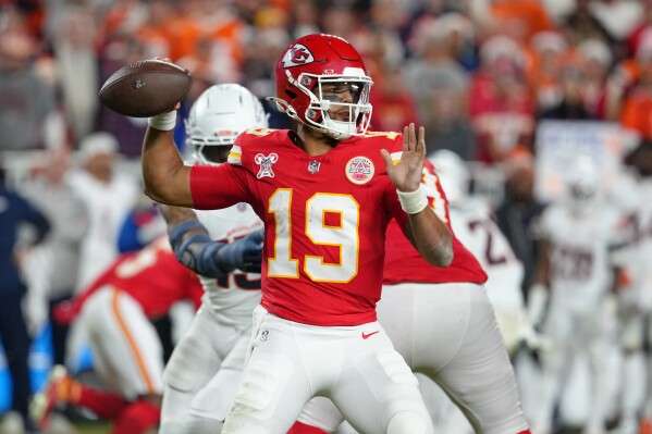 Kansas City Chiefs quarterback Chris Oladokun throws a pass against the Denver Broncos during the second half of an NFL football game Thursday, Dec. 25, 2025, in Kansas City. (AP Photo/Ed Zurga)