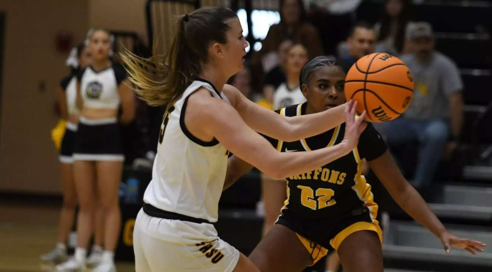 Fort Hays State's Brooke Loewe distributes one of her 14 assists vs. Missouri Western State on Saturday./ Photo courtesy of FHSU Athletics-Nicole Heitmann