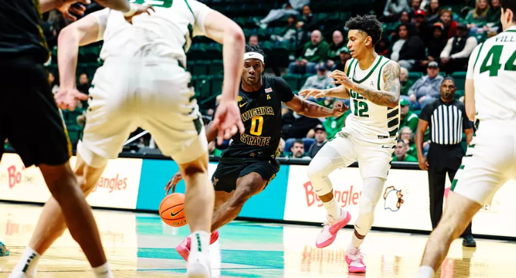 Karon Boyd drives past a Charlotte defender in their 104-100 loss on Jan. 3, 2025 (Photo courtesy Wichita State Athletic Communications) 