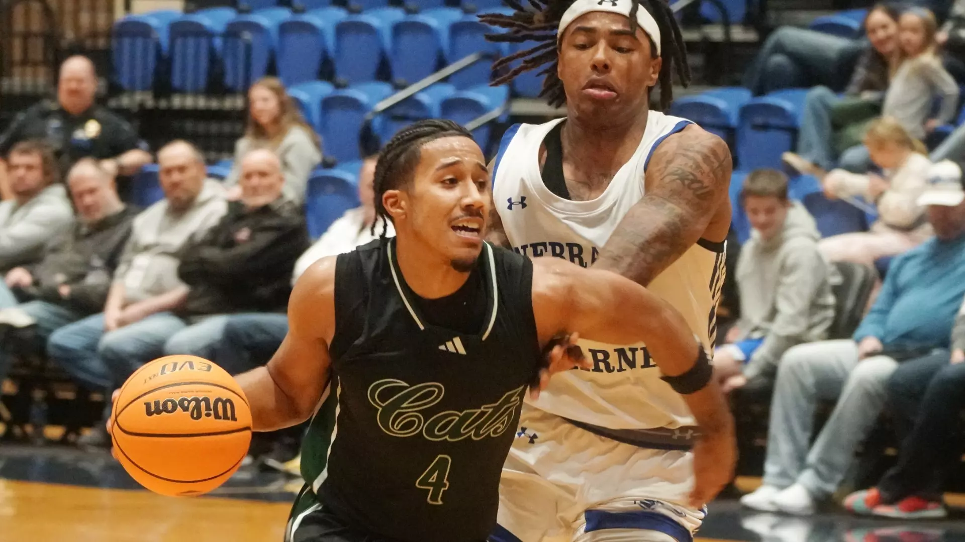 Royce Williams drives into the basket against Nebraska Kearney. Williams scored a team high 25 points in a 100-94 win over the Lopers for the Bearcats/ Photo courtesy of Jon Dykstra-Maryville Forum