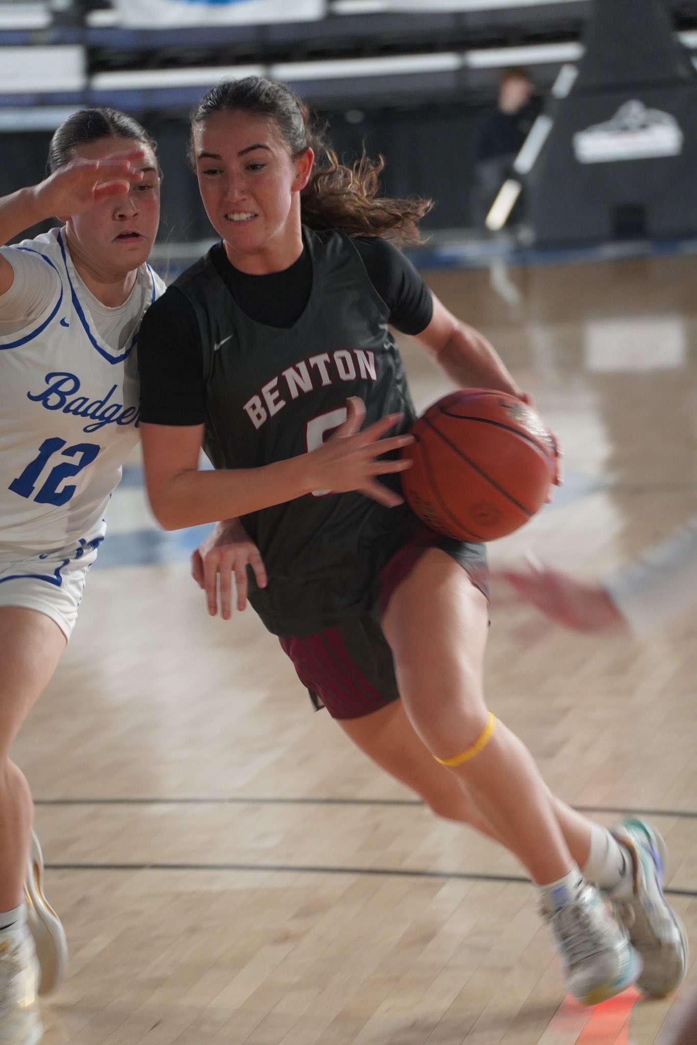 Benton's&nbsp;Eliana Arambula drives inside against a Bennington defender during the St. Joseph Sports Commission Winter High School showcase at Civic Arena/ Photo courtesy of Clifton Grooms