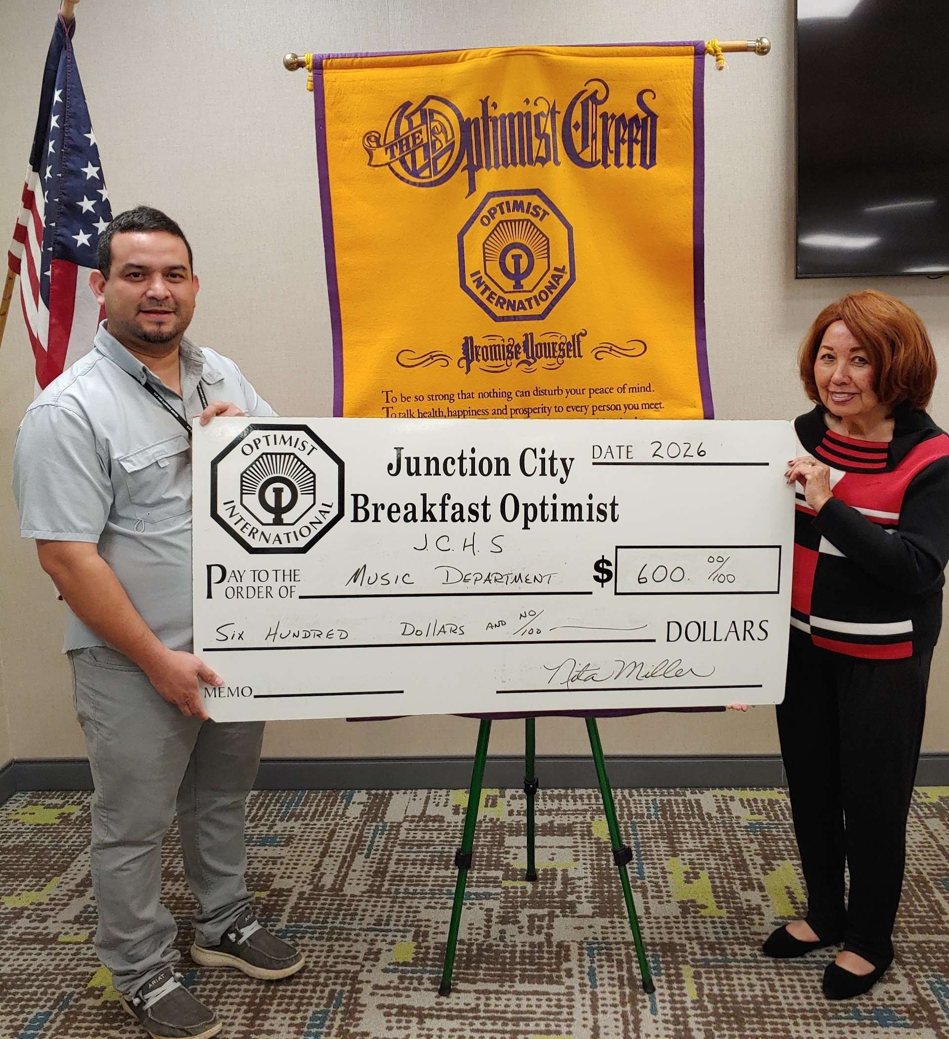 Pictured left to right are Caesar Martinez-Reyes and Nita Miller, JC Breakfast Optimist Club President 