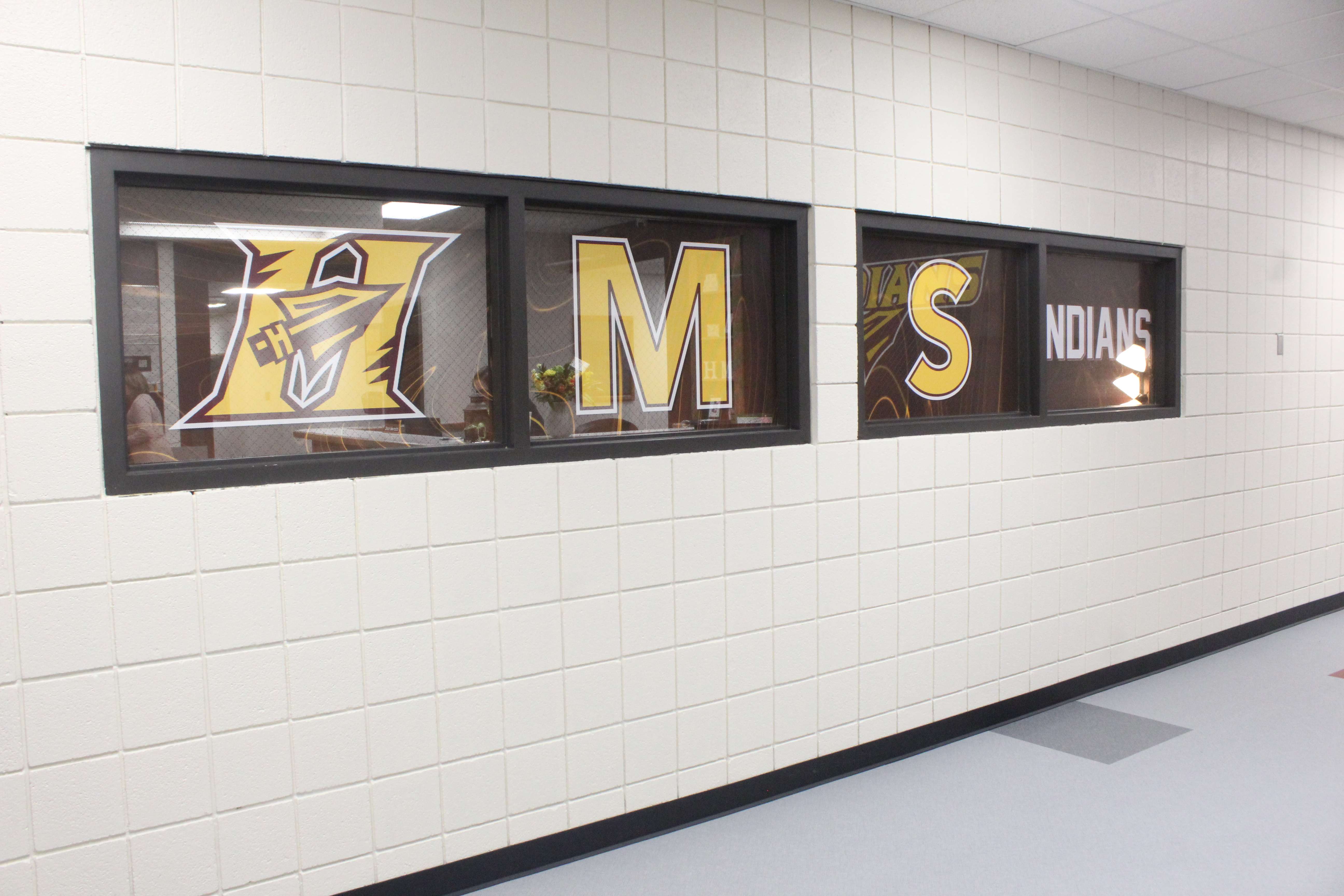 Hays Middle School has adopted the same logo, mascot and colors as Hays High School. The new building has been rebranded with the new logo and name. Photo by Cristina Janney/Hays Post
