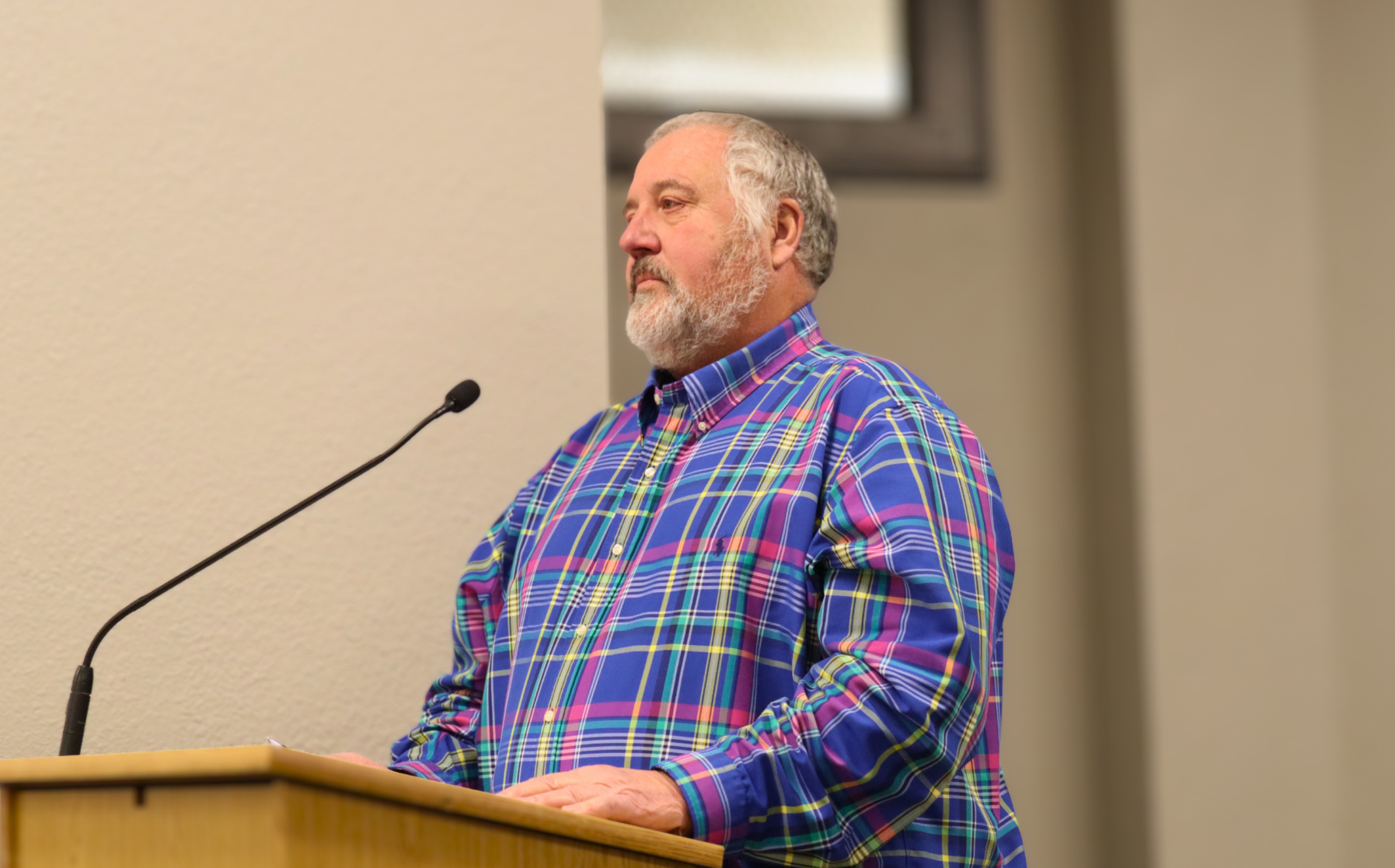 Barton County Treasurer Jim Jordan presenting details about the designation of official depositories for county funds.