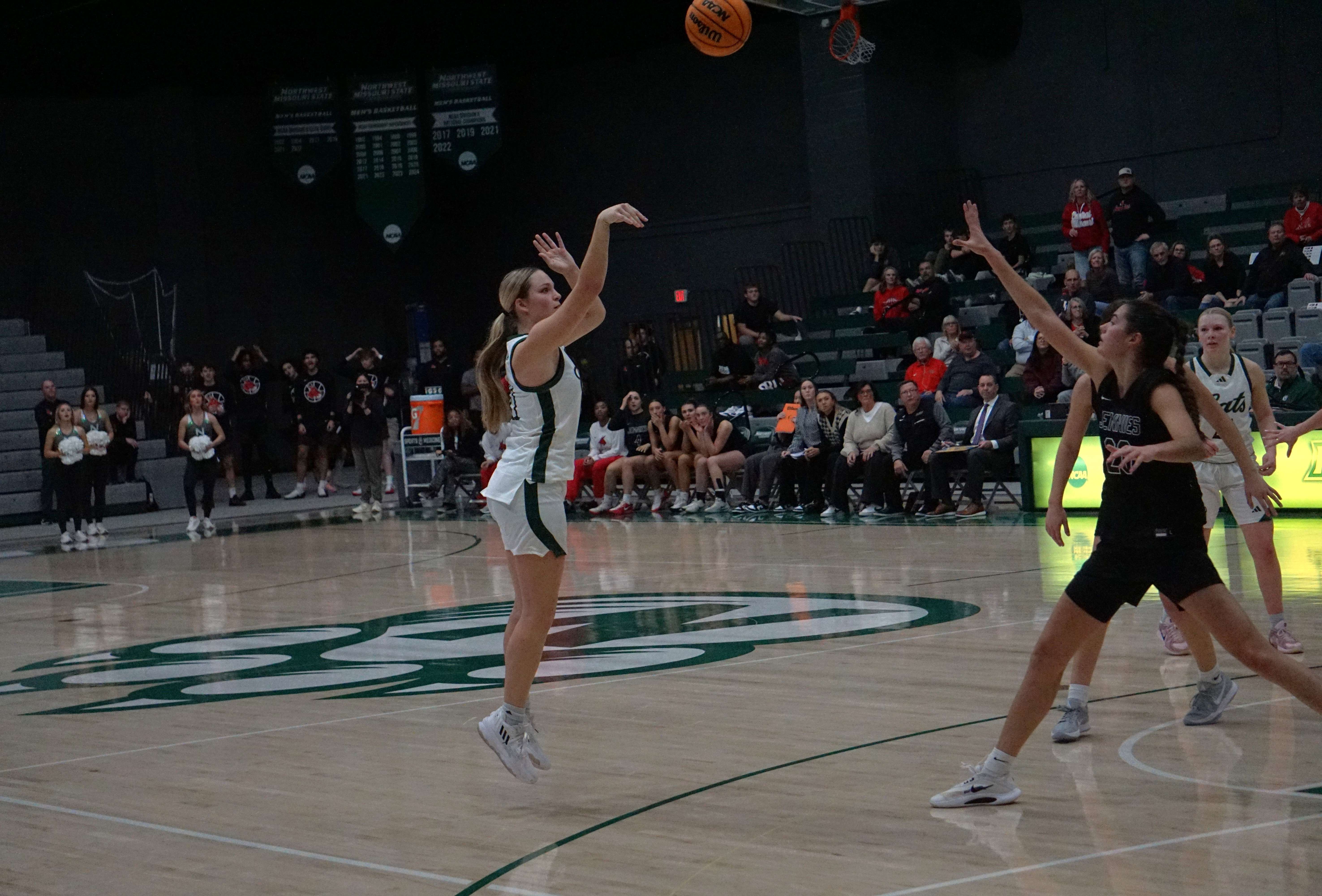 Central alum and Northwest senior Ella Moody takes a three point shot against UCM/ Photo by Matt Pike