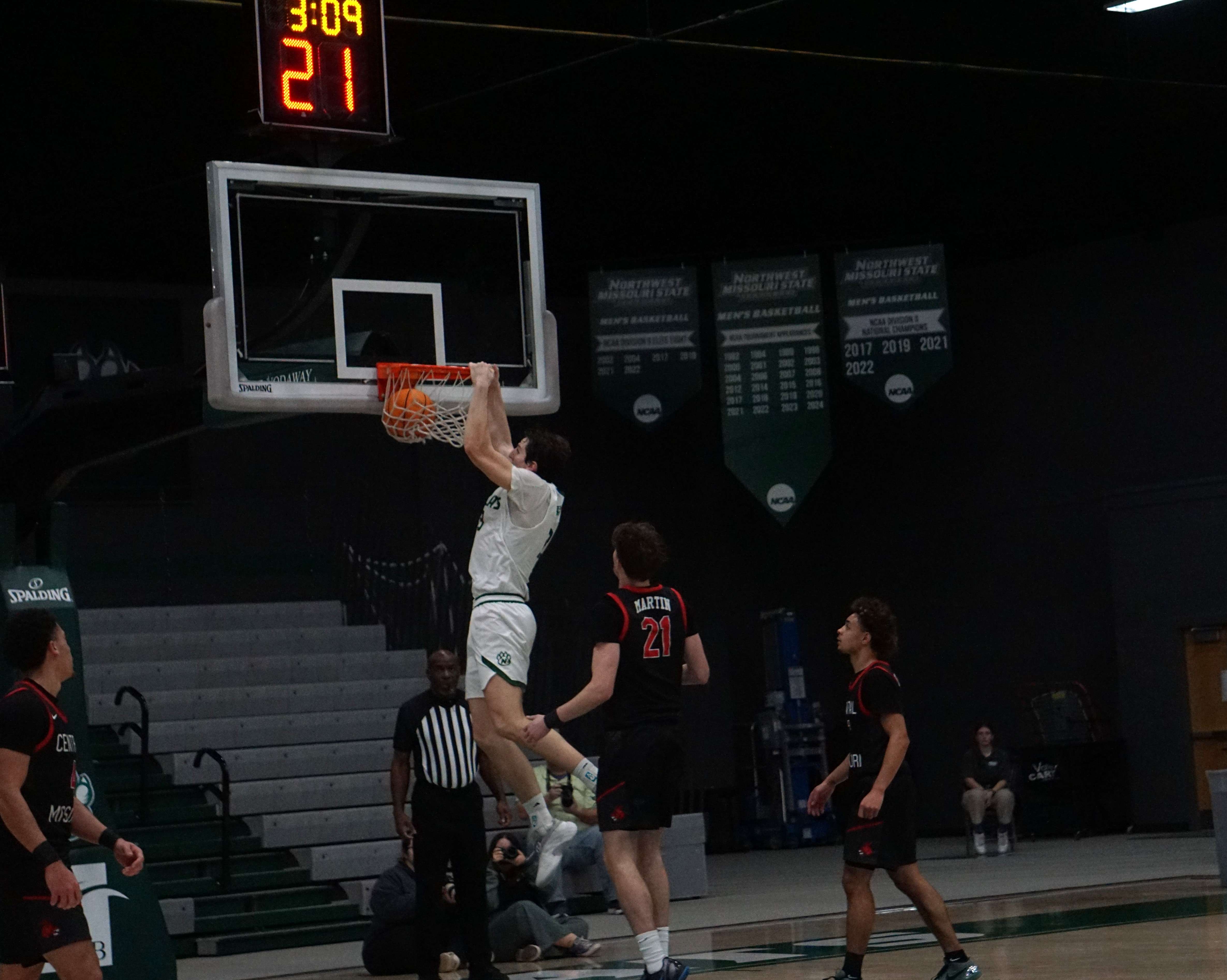 Jack Ratigan slams home a dunk in the first half against UCM/ Photo by Matt Pike