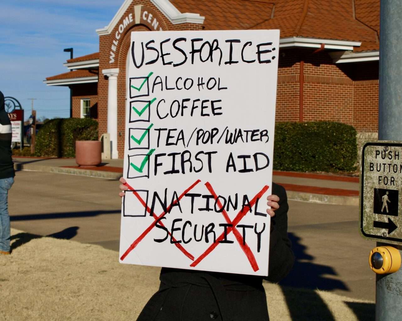 A protest sign during Sunday's demonstration. Photo by Tony Guerrero/Hays Post