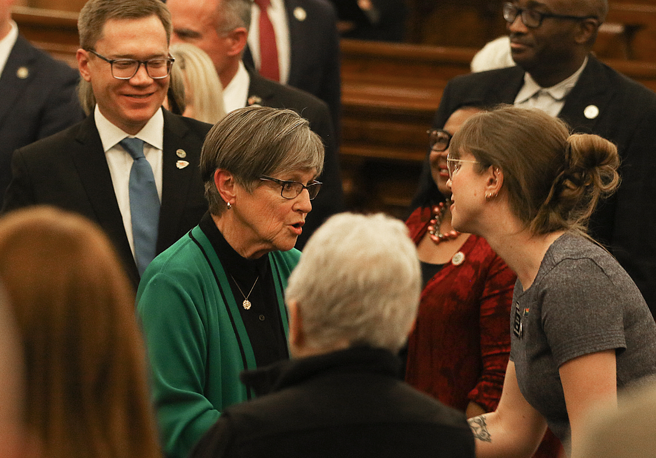 Kansas Governor Laura Kelly greets lawmakers Tuesday night (Photo by Thad Allton for Kansas Reflector)