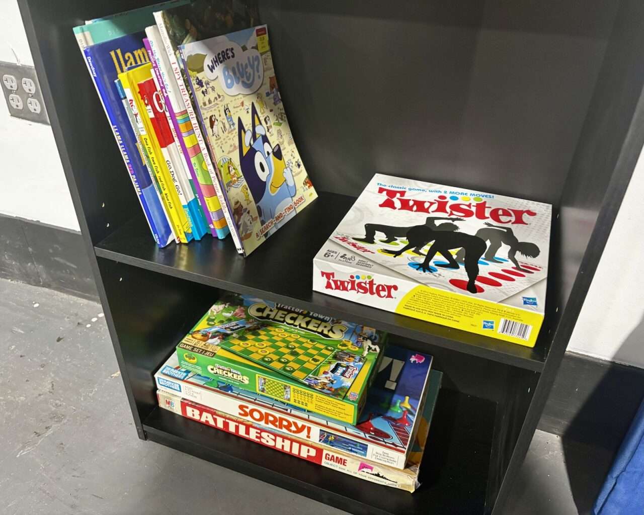 Board games and books for Hays Buffaloes. Photo by Tony Guerrero/Hays Post