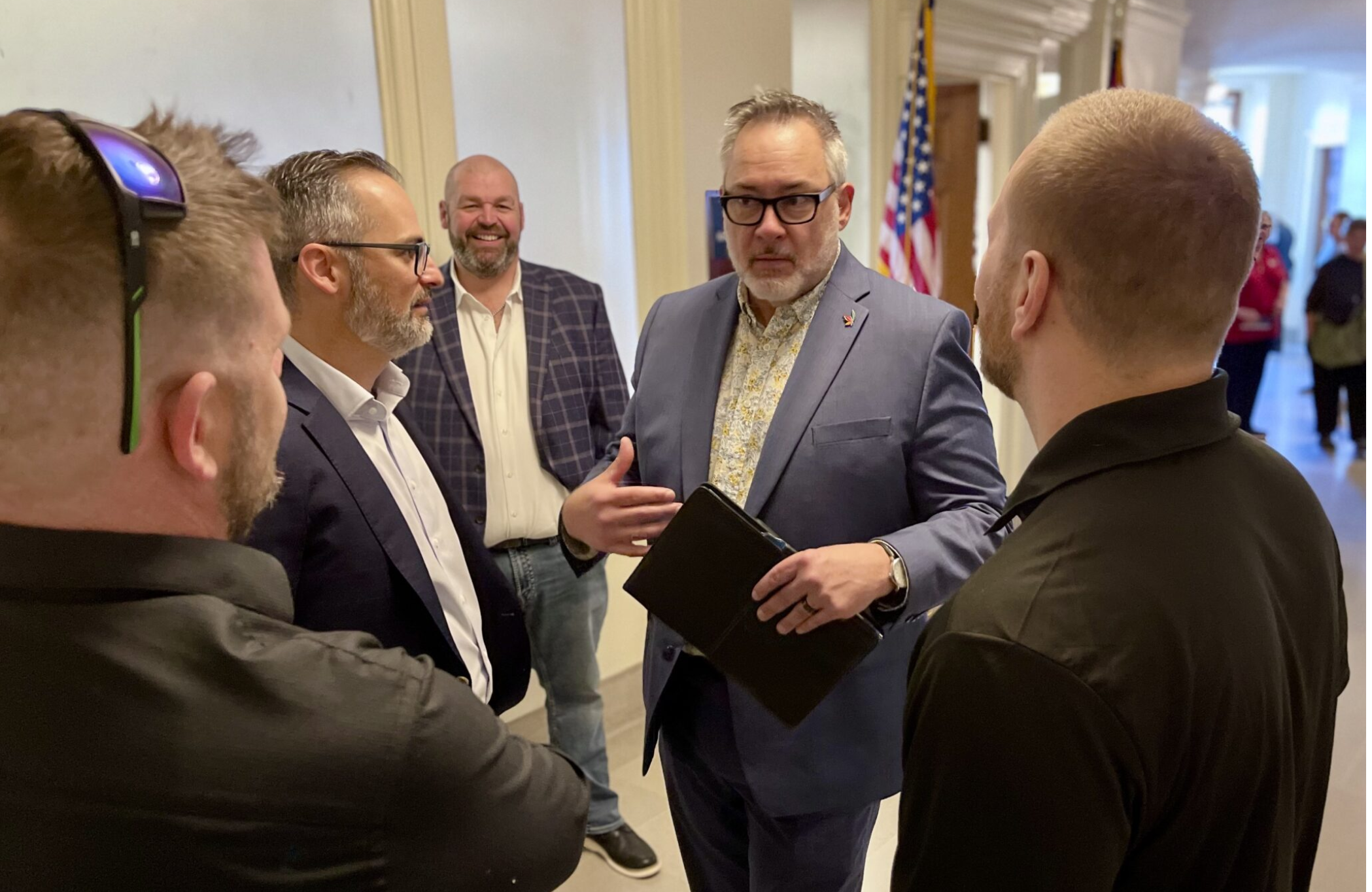  Andrew Mullins, executive director of the Missouri Cannabis Trade Association, speaks with industry members during the association’s annual lobby day on March 11 at the state Capitol (Rebecca Rivas/Missouri Independent).