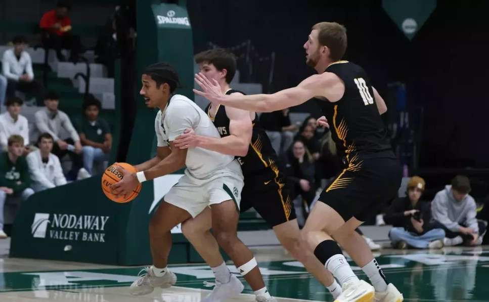 Fort Hays State's Lucas Hammeke (3) and Blake Danitschek (10) defend Northwest Missouri State's  Royce Williams on Saturday, January 17, 2026 in Maryville, Mo. (FHSU Athletics photo/Kaileen Dohrmann/NMSU Athletics)