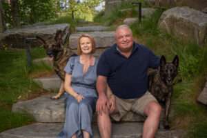 Mark and Robyn Jones of Texas with their dogs, Jester, left, and Dottie. (Courtesy of the Jones family)