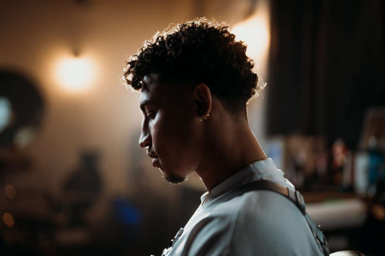 Stull was born in Hays in 2004 and is now a barber at Fade Factory, 129 East Eighth St., following a childhood of instability and abuse. Courtesy photo