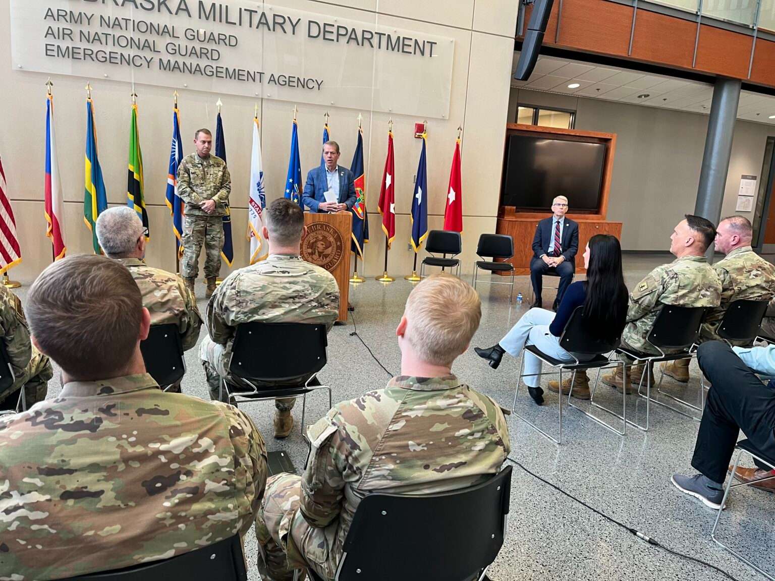 Maj. Gen. Craig Strong (left), and Gov. Jim Pillen (right), speak about an upcoming deployment of 200 Nebraska National Guard members to Washington D.C. (Erin Bamer/Nebraska Examiner)