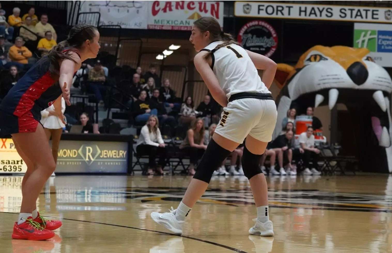 Fort Hays State guard Mikayla Pilley (1) surveys the Rogers State defense on Thursday, January 22, 2026 in Hays, Kan. (FHSU Athletics photo/Gillian Lynch)