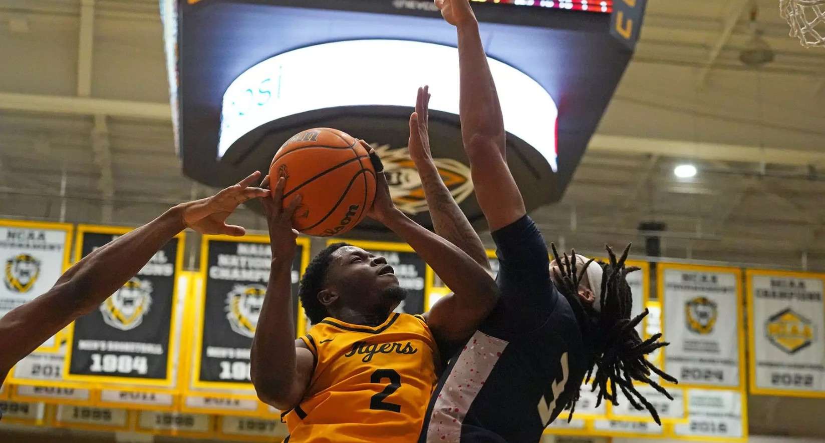 Fort Hays State guard Muhamed Kante drives to the basket against Rogers State's Jabryn Anderson in the second half of an NCAA college basketball game on Thursday, January 22, 2026 in Hays, Kan. (FHSU Athletics photo/Gillian Lynch)