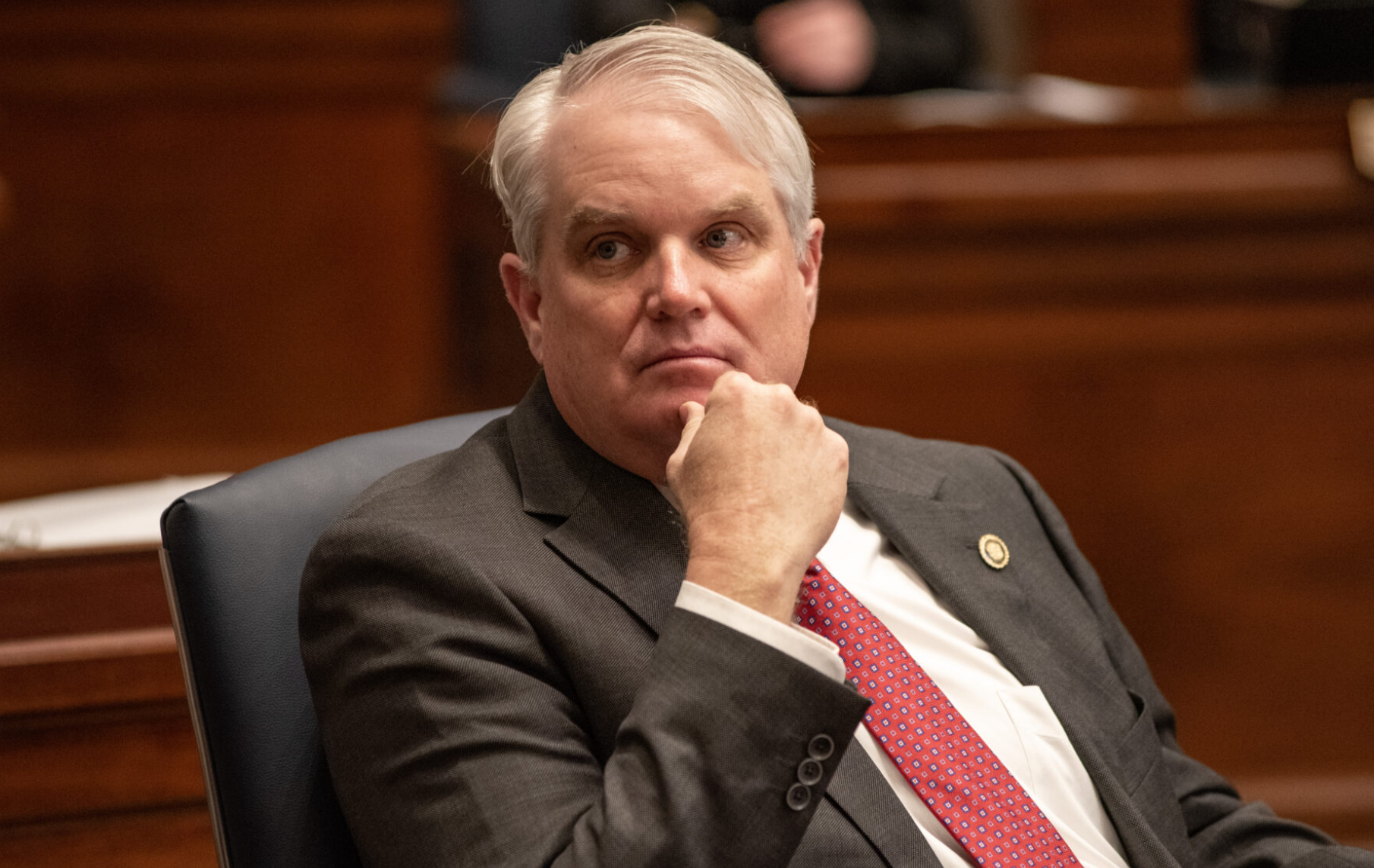  Republican state Sen. Jason Bean of Holcomb, pictured listening from his Senate desk Feb. 12, 2024, has sponsored a bill seeking state oversight of the Missouri State High School Activities Association for three consecutive years. This legislative session, his proposal is gaining traction early on in session (Annelise Hanshaw/Missouri Independent).