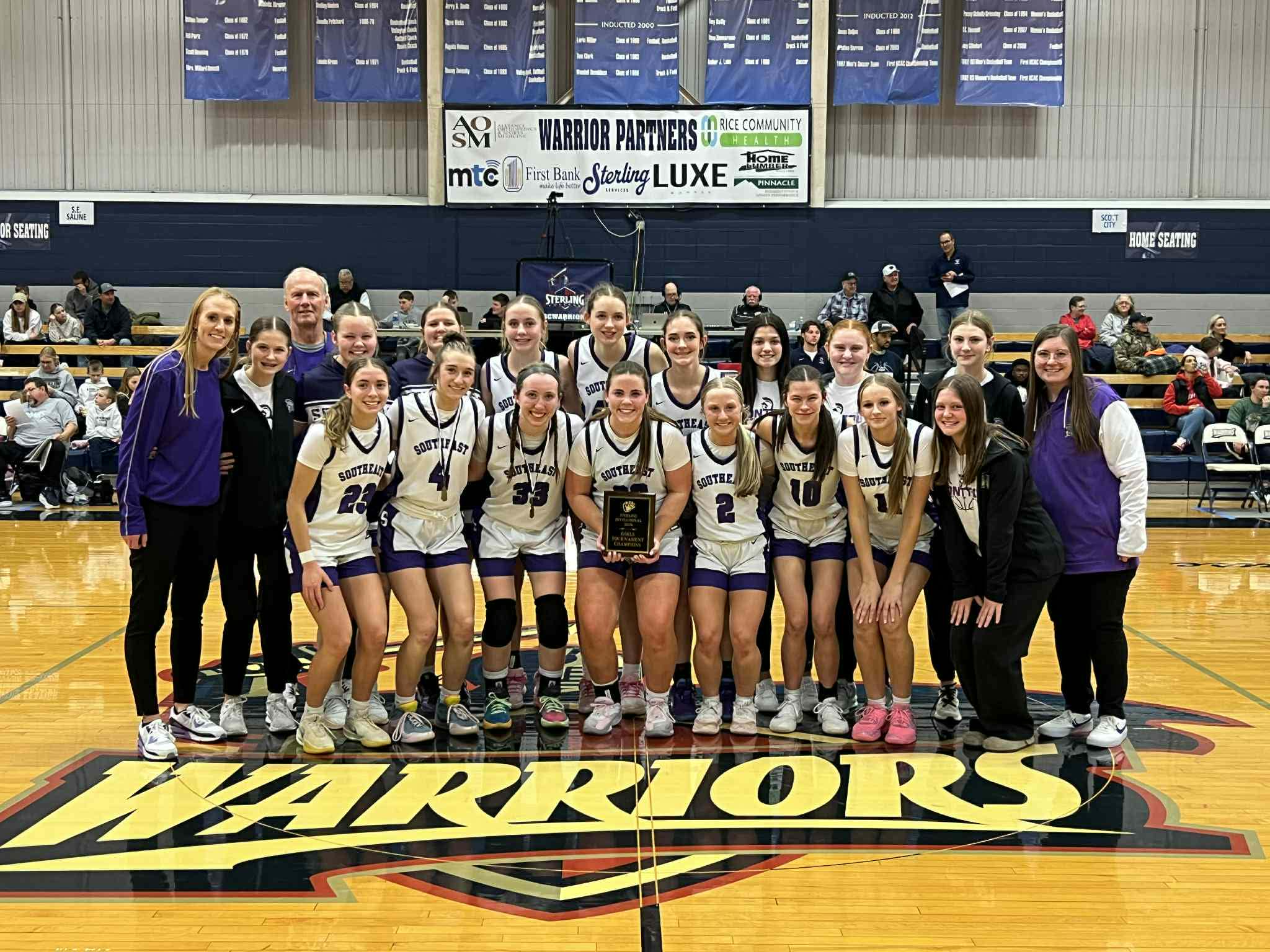 The Lady Trojans stand tall with a Sterling Tournament title in hand