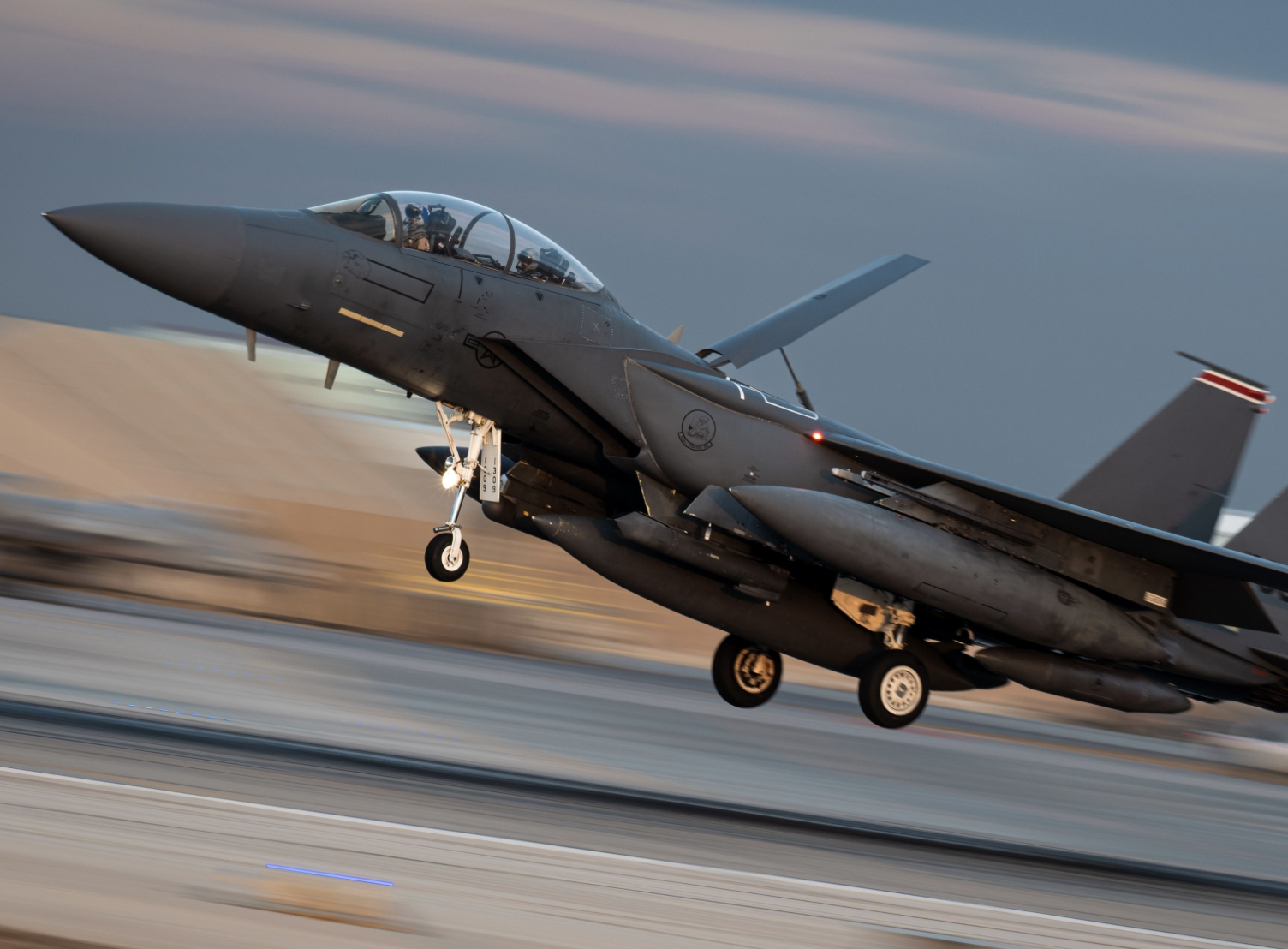 A U.S. Air Force F-15E Strike Eagle assigned to the 494th Expeditionary Fighter Squadron lands at a base in the Middle East, Jan. 18.-photo U.S. Central Command 