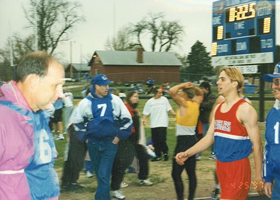 Prosser set school records in the 100m and 200m dashes while running for Ellinwood High School.