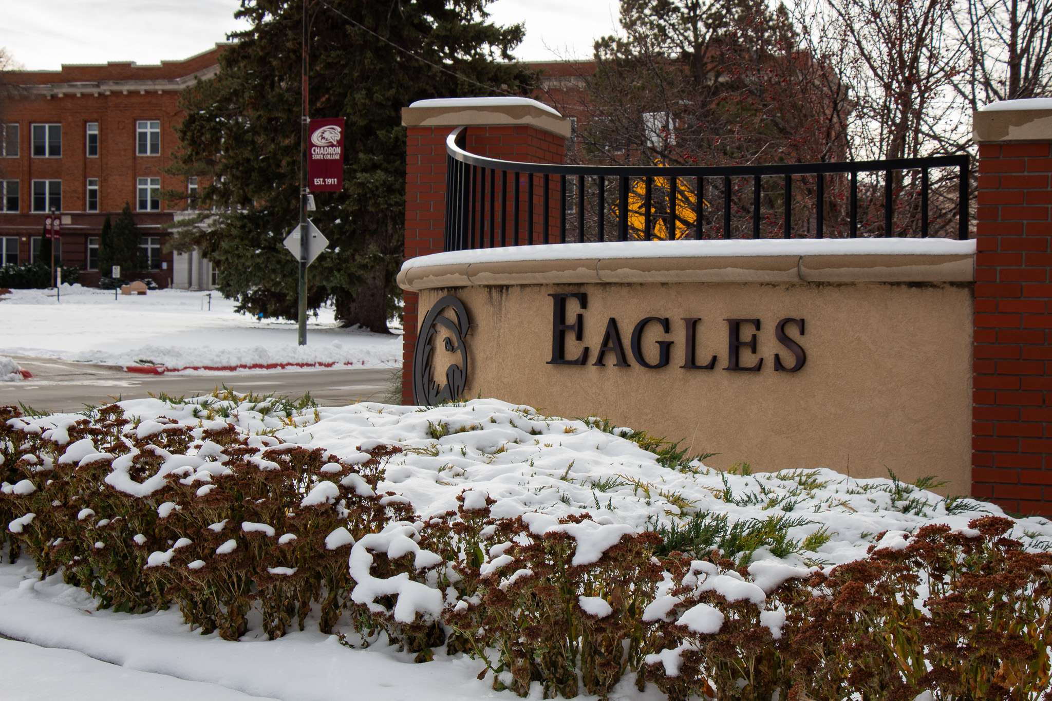 The first snow of the semester coats the Chadron State College campus near the West entrance on Dec. 2, 2025. (Photo by Shelby Westinghouse/Chadron State College)
