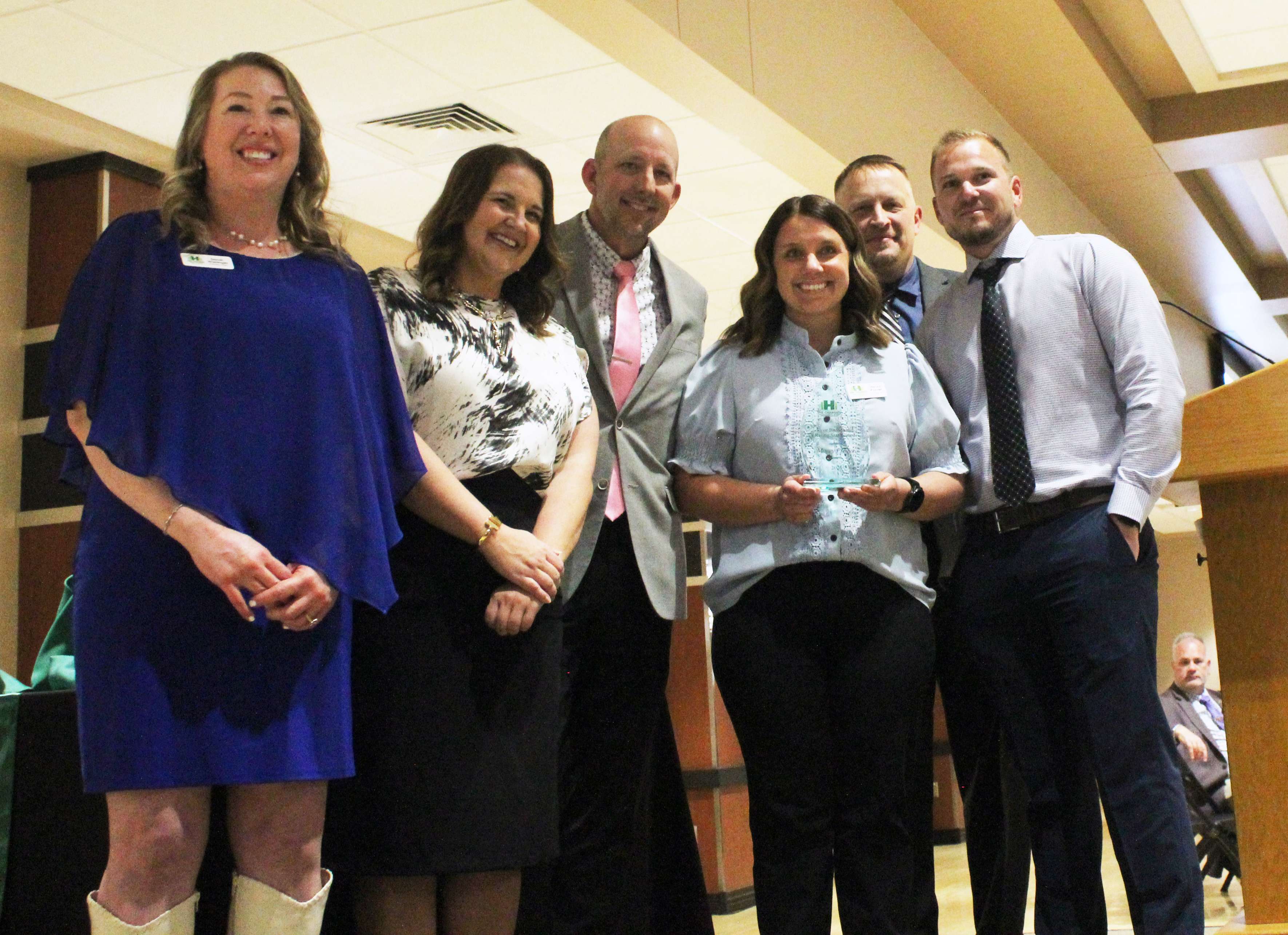 Macey Pfeifer accepts the Vyve Broadband Rising Star Award.&nbsp;Photo by Cristina Janney/Hays Post