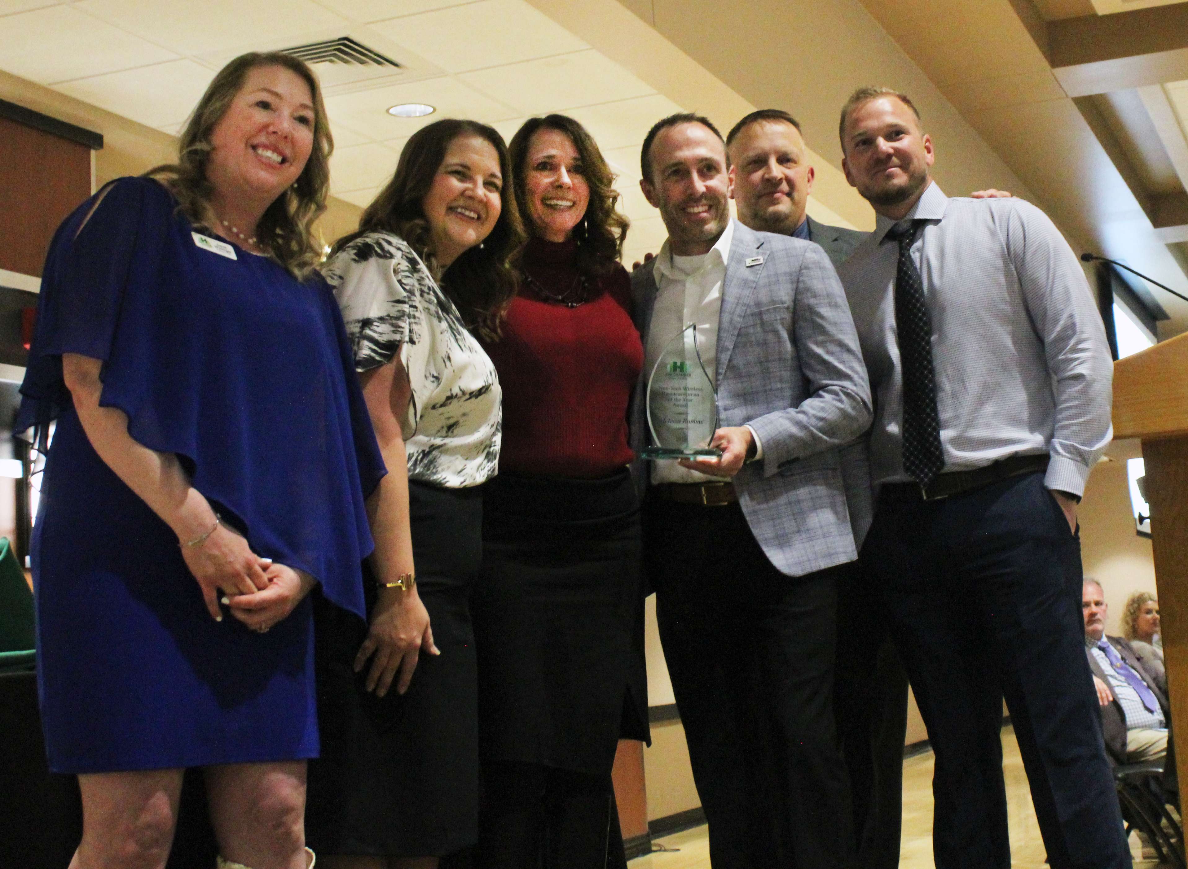 Melissa Romme accepts the Nex-Tech Wireless Businesswoman of the Year Award.&nbsp;Photo by Cristina Janney/Hays Post