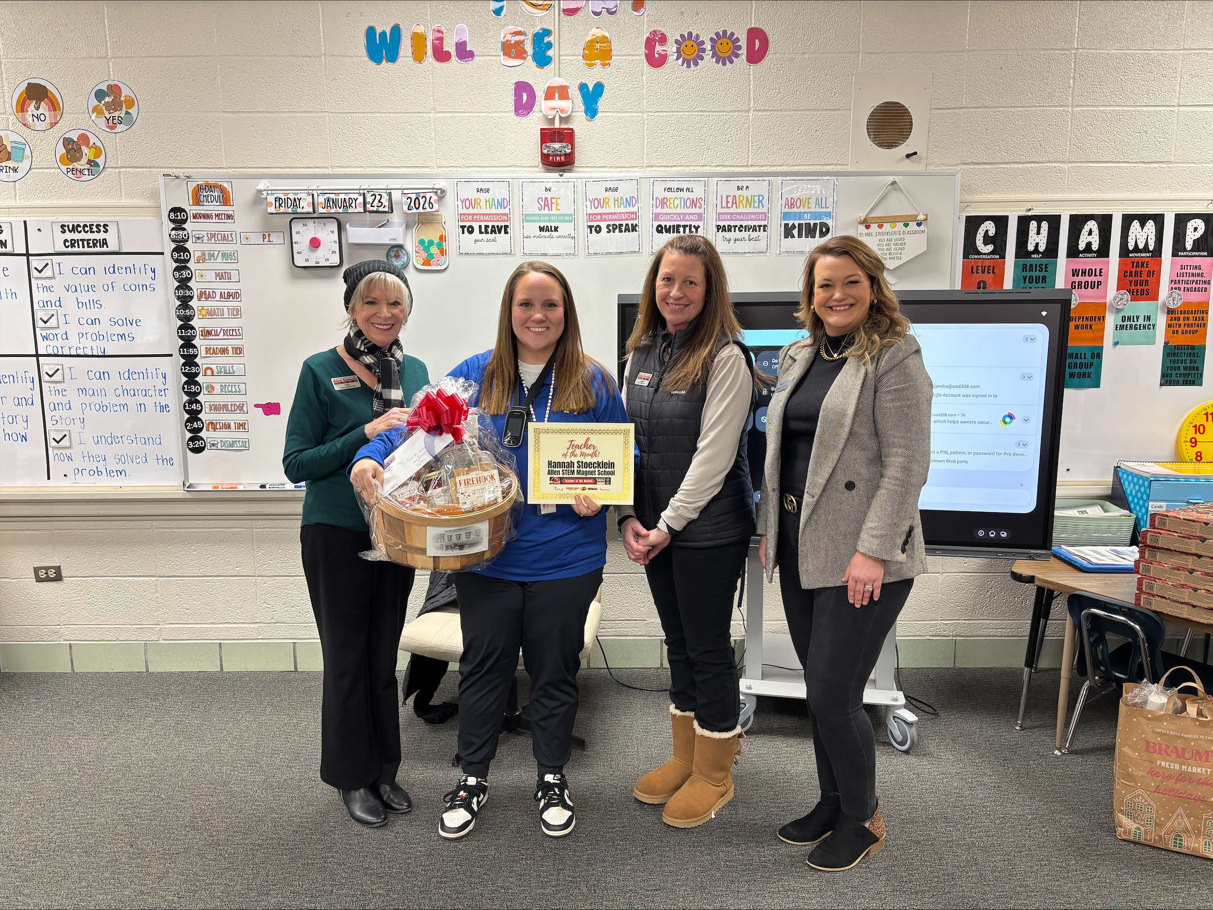 From left, Cris Schul, sales consultant and marketing representative with Allen Samuels Chrysler Dodge Jeep Ram, Hannah Stoecklein, Sandy Baker, sales consultant with Allen Samuels, and Ashley Weve, digital marketing director with Eagle Media, pose after Stoecklein was named Teacher of the Month for January at Allen STEM Magnet School. (Hutch Post photo)