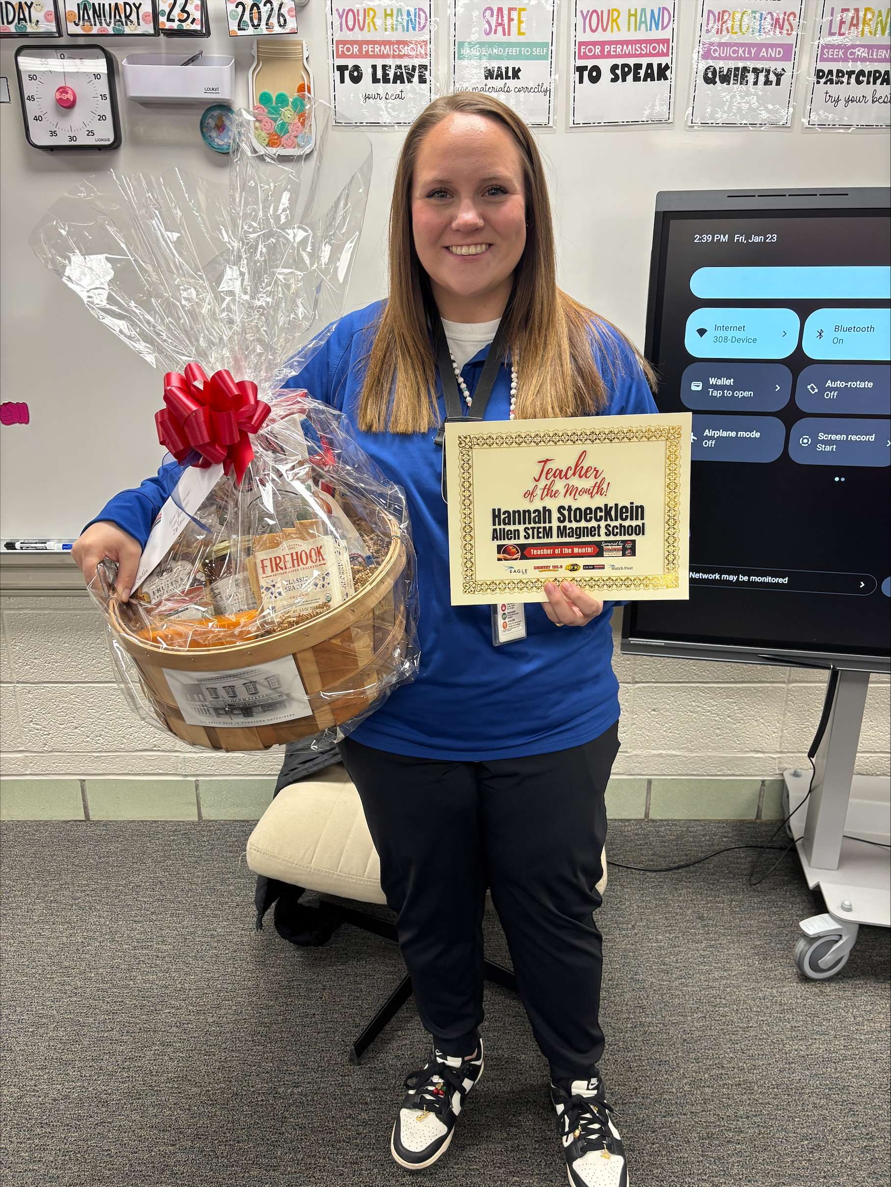 Allen STEM Magnet School second-grade teacher Hannah Stoecklein, the January Teacher of the Month presented by Allen Samuels Chrysler Dodge Jeep Ram, is pictured with her class after receiving the award. (Hutch Post photo)