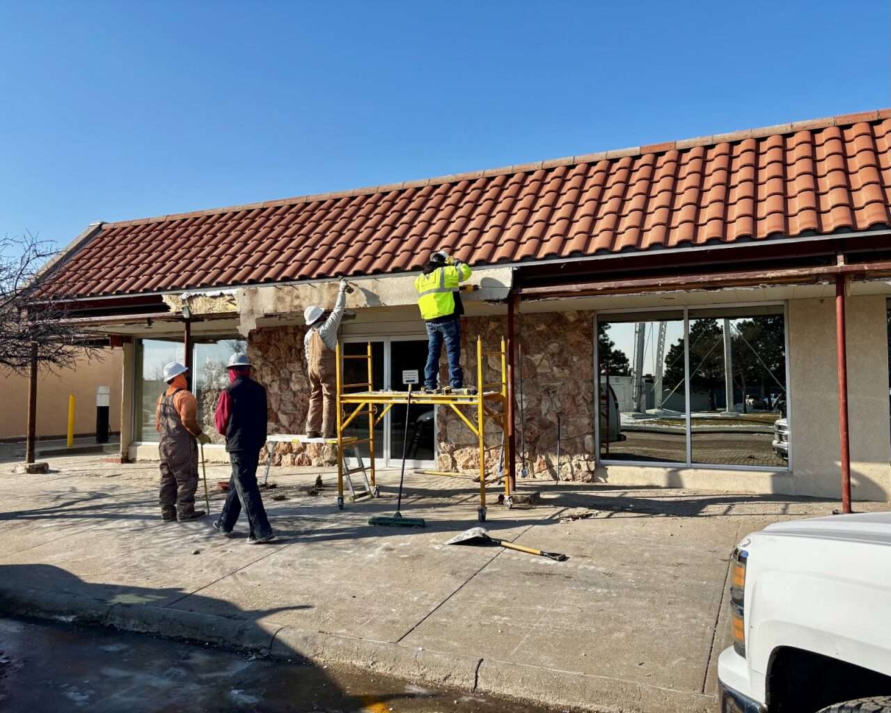 Construction workers at First Federal Bank in Wakeeney. Photo by Tony Guerrero/Hays Post