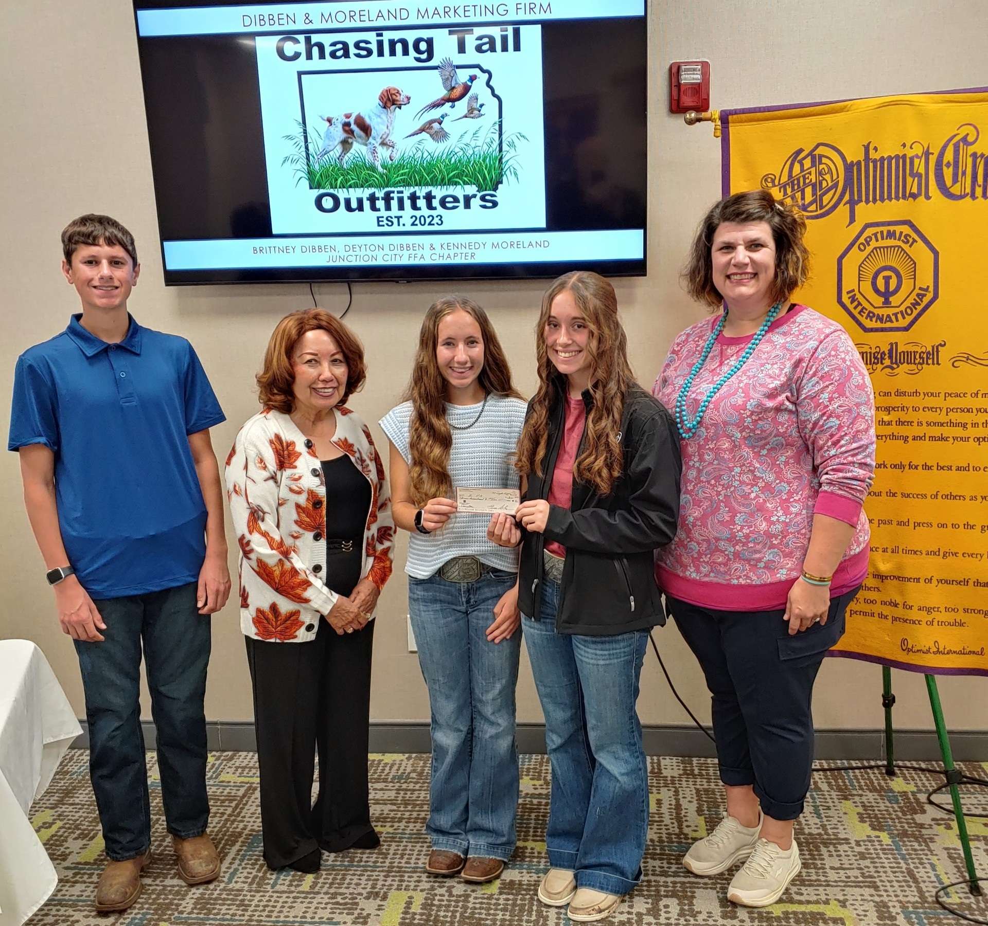 Pictured left to right: Deyton Dibben; Nita Miller, JC Breakfast Optimist Club President; Brittany Dibben; Kennedy Moreland and Laura Miller, JCHS teacher and FFA Advisor