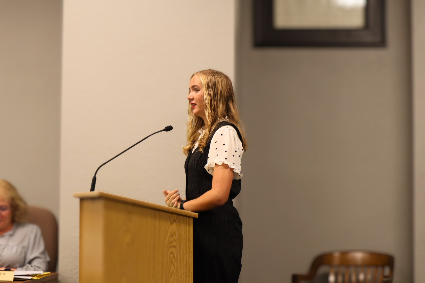 Samantha Negaard shares her award-winning 4-H Performing Arts project with the Barton County Commission after being recognized as a Kansas State Project Award winner.