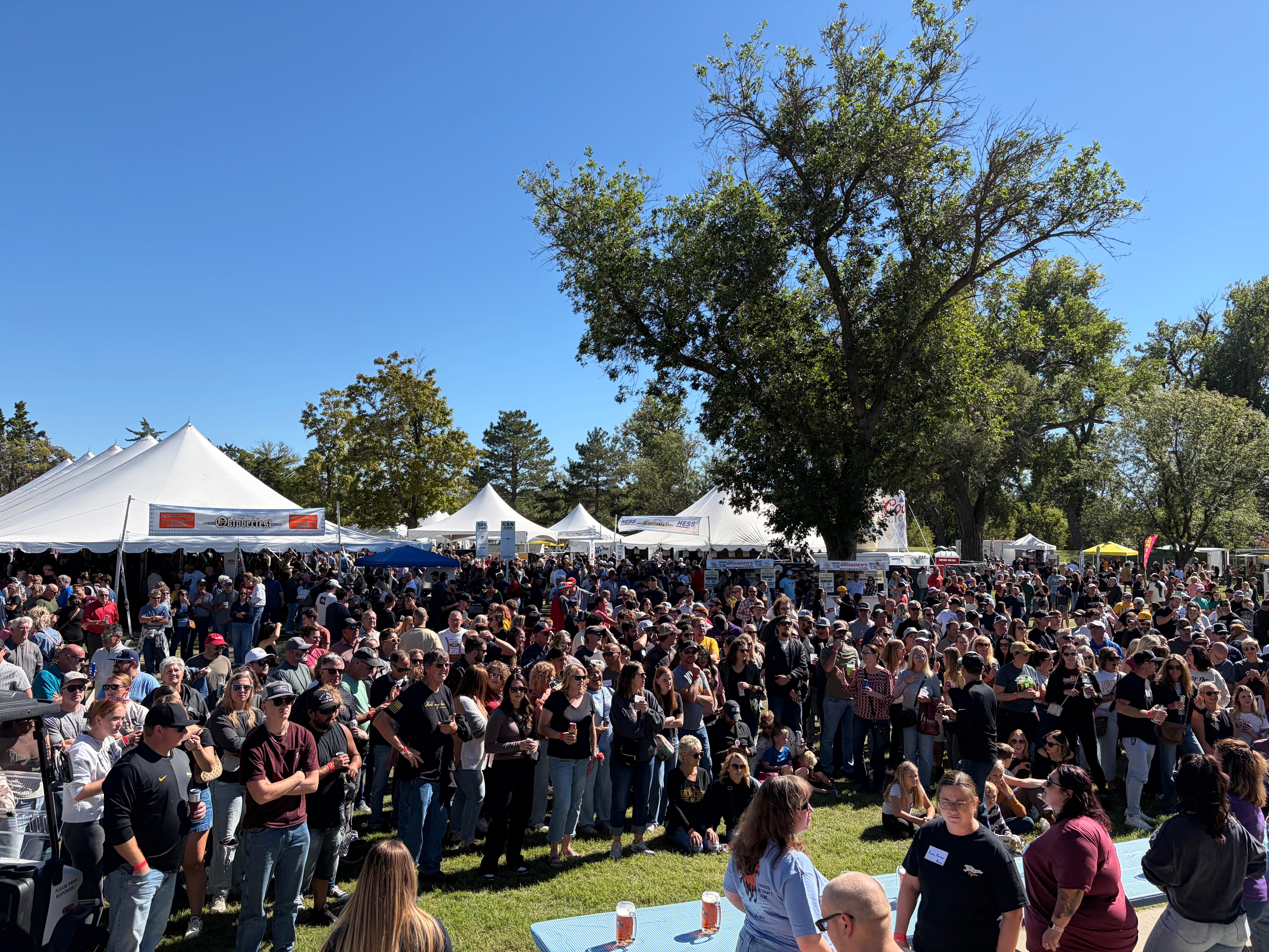 Point of view shot from the stage showing the audience before the female steinholding competition at Oktoberfest Hays 2026. Photo by Alin Hett/Hays Post