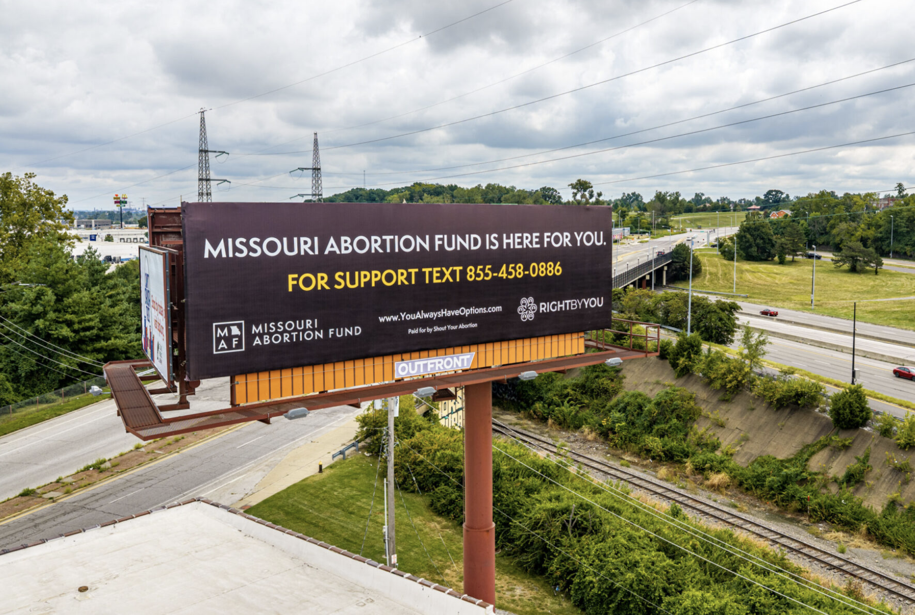 A billboard campaign by Missouri Abortion Fund and Shout Your Abortion is part of an effort to raise awareness around telehealth medication abortion access ahead of the November vote on abortion. One of the billboards is located off Interstate 70 in St. Louis (photo provided by STL From Above).