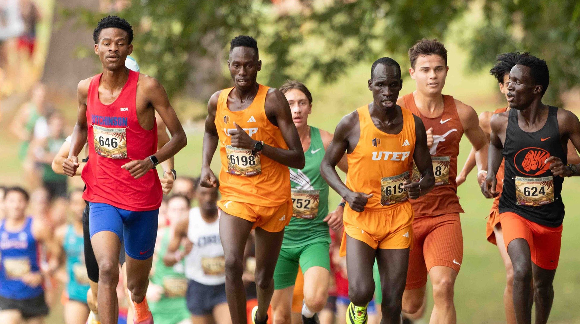 Blue Dragon freshman Letsepa Prince Madume duels with some of the top NCAA runners in the nation and finishes fifth at the Chile Pepper Festival on Saturday in Fayetteville, AR. (Photo courtesy Ed Bailey)