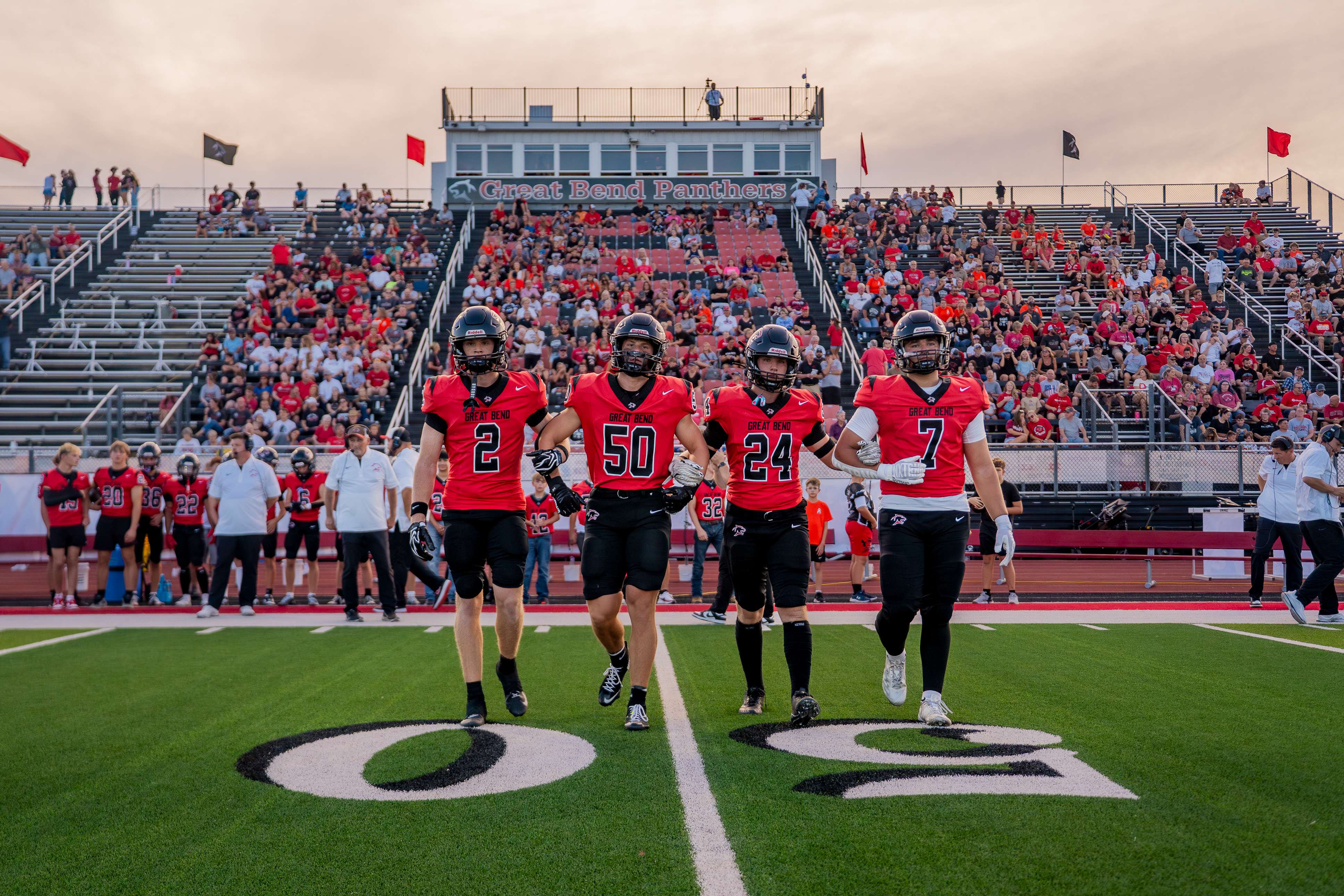 GBHS Football captains walk onto the field at the home opener against Scott Community High School on Sept. 9. The Panthers will take on the Liberal Redskins for their Homecoming game on Oct. 9. Homecoming King &amp; Queen will be crowned at the coronation ceremony at 6:30 p.m., followed by kickoff at 7 p.m. (Photo by Patrick Heath)