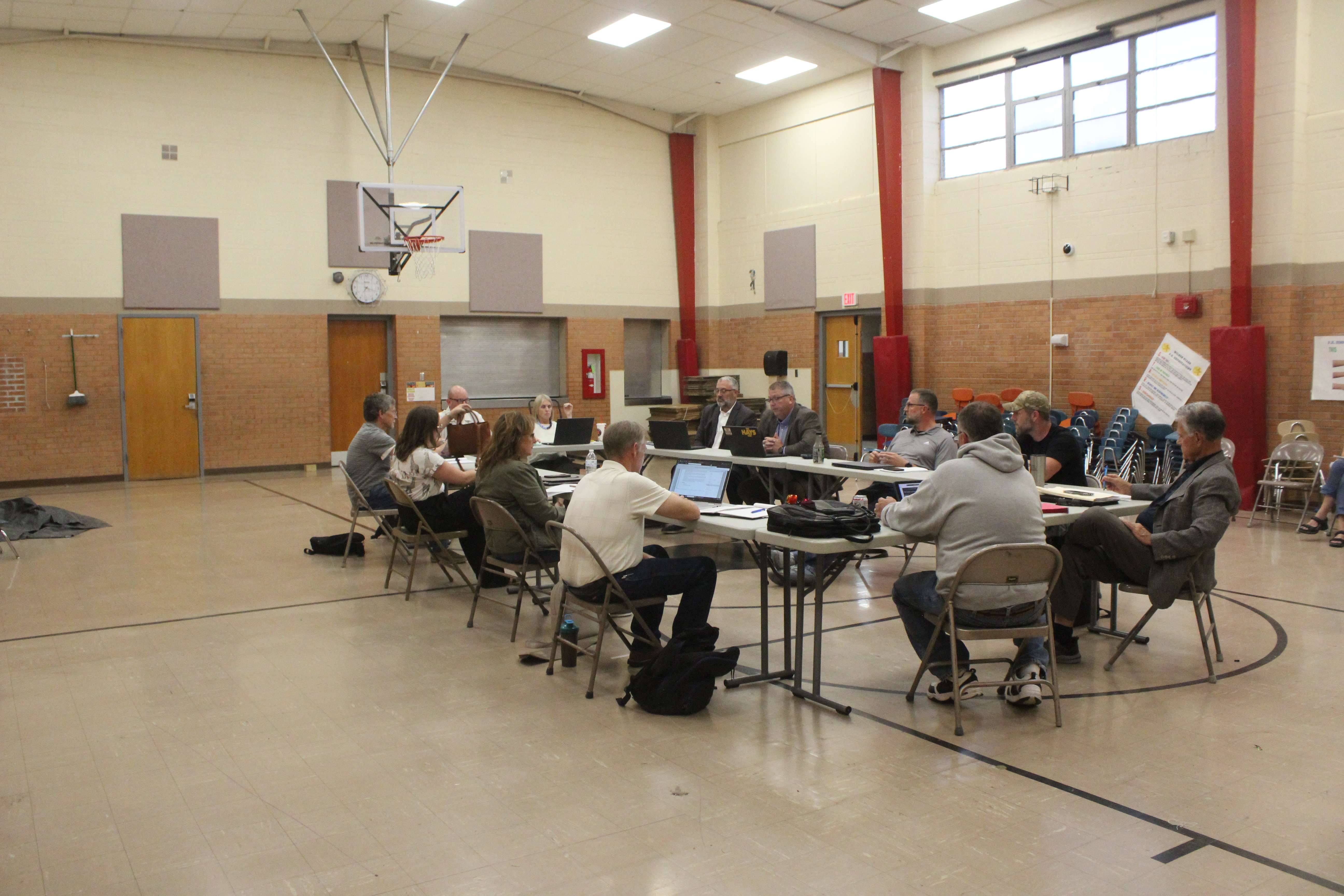 The Hays USD 489 school board meets in the former Wilson school gym. The school is set to be renovated into administrative offices. The gym will be the board room/training room. Photo by Cristina Janney/Hays Post