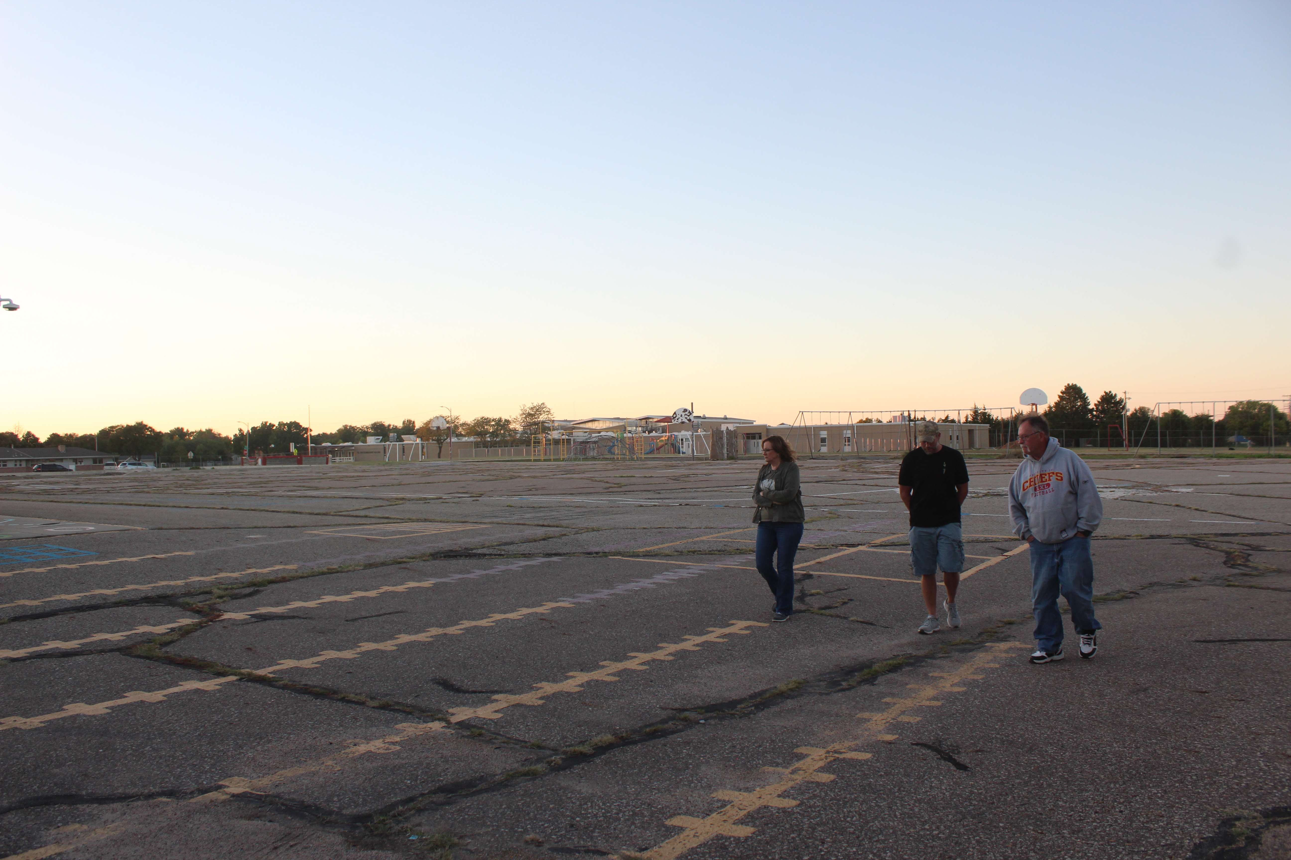 The school district will likely build a new warehouse on what used to be this paved playground area. Photo by Cristina Janney/Hays Post