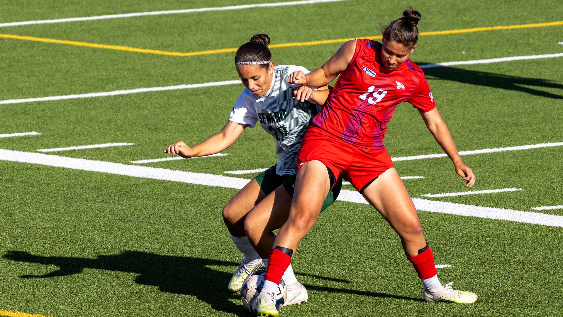 Ariadna Zwenger battles for possession with a Seward County player in the defensive end of the field at Liberal High School as the Blue Dragons earned a 3-1 KJCCC road win on Wednesday night. (Photo courtesy Seward County Sports Information)