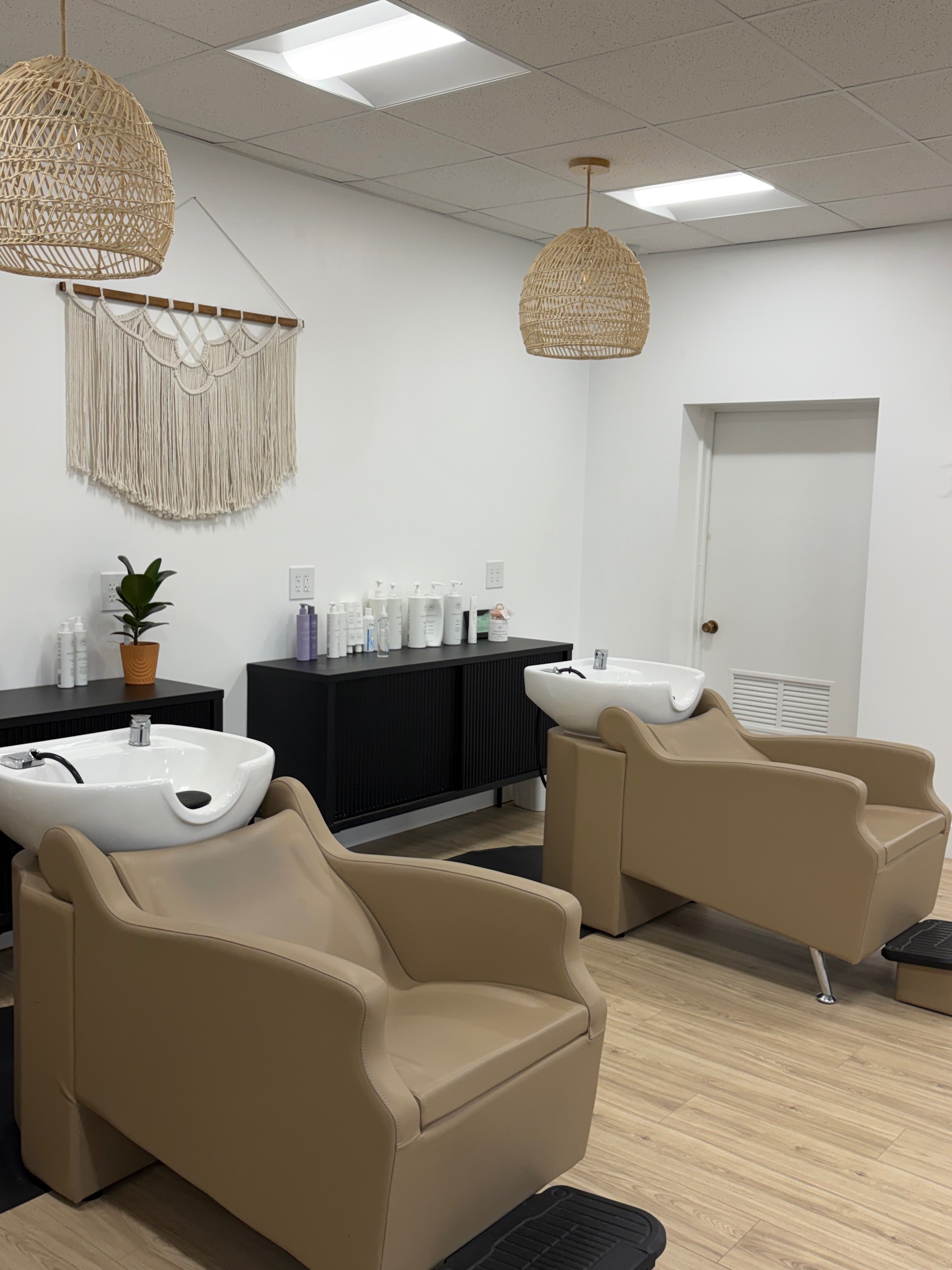 Schaeffer and Burkholders shampoo bowls inside Salt and Light Salon and Suites. Photo by Alin Hett/Hays Post