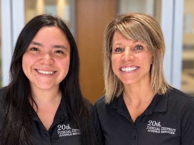 Paulina Martinez, left, and Blakelee Cooper are using technology at Juvenile Services that saves them time and helps their clients. Both are community case managers.