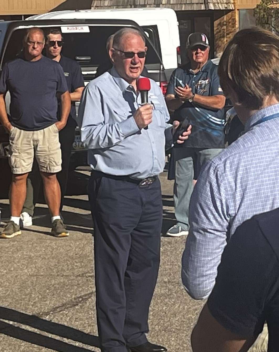 Dan Hawkins speaks to attendees at the GOP bus stop in Hutchinson (Hutch Post photo),