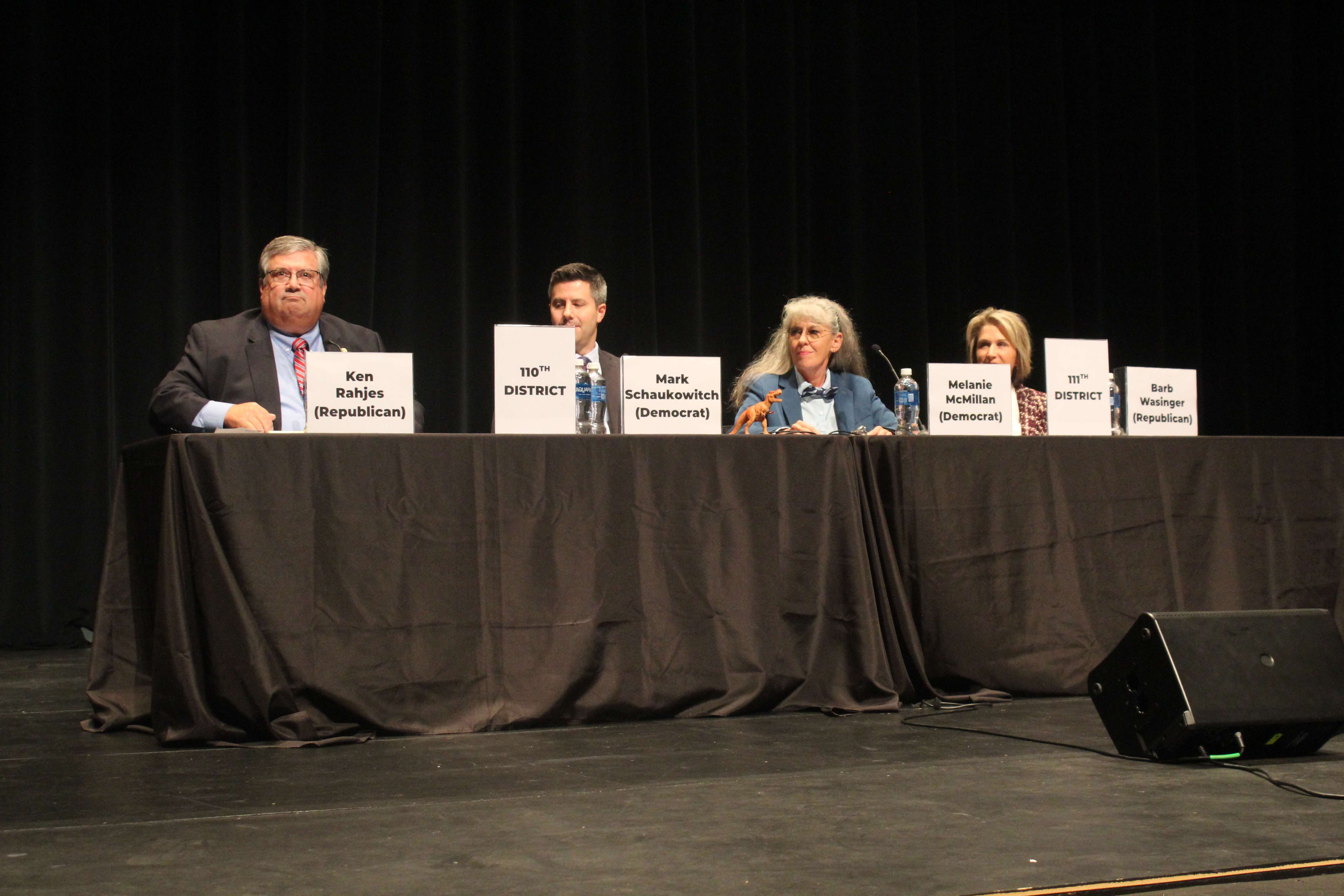 From left, Republican candidate for the 110th Kansas House seat Ken Rahjes, Democratic candidate for the 110th seat Mark Schaukowitch, Democratic candidate for the Kansas House 11th seat Melanie McMillan and&nbsp; Republican candidate for the 11th seat Barbara Wasinger at a candidate forum at the Beach Schmidt Performing Arts Center on Tuesday night. Photo by Cristina Janney/Hays Post