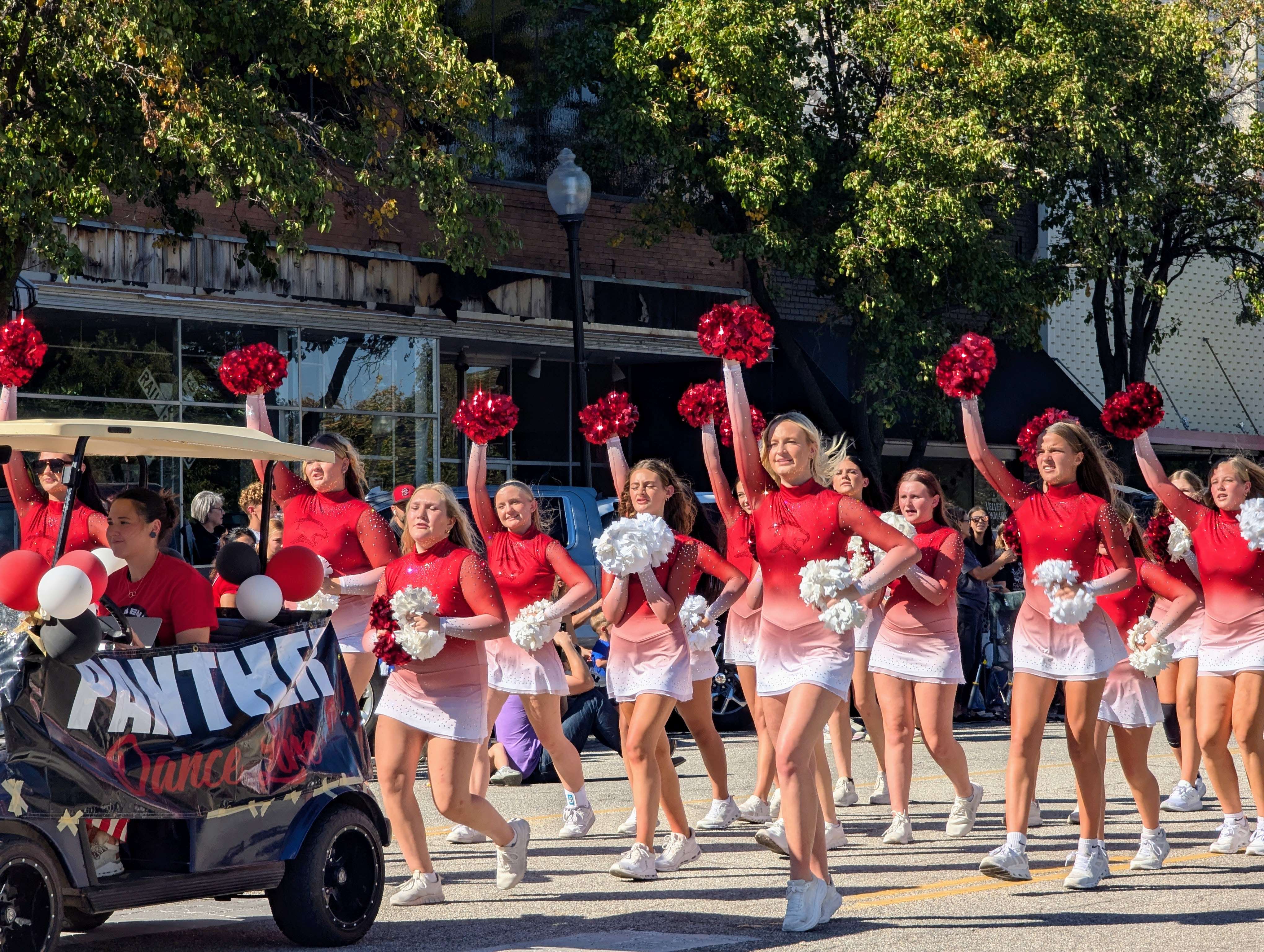 Panther Danceline marches down Main Street, Great Bend, but is preparing for Mainstreet USA when they visit Disney World in January 2027 to learn from top-tier entertainment professionals. (photos by Andrea Bauer/USD 428)