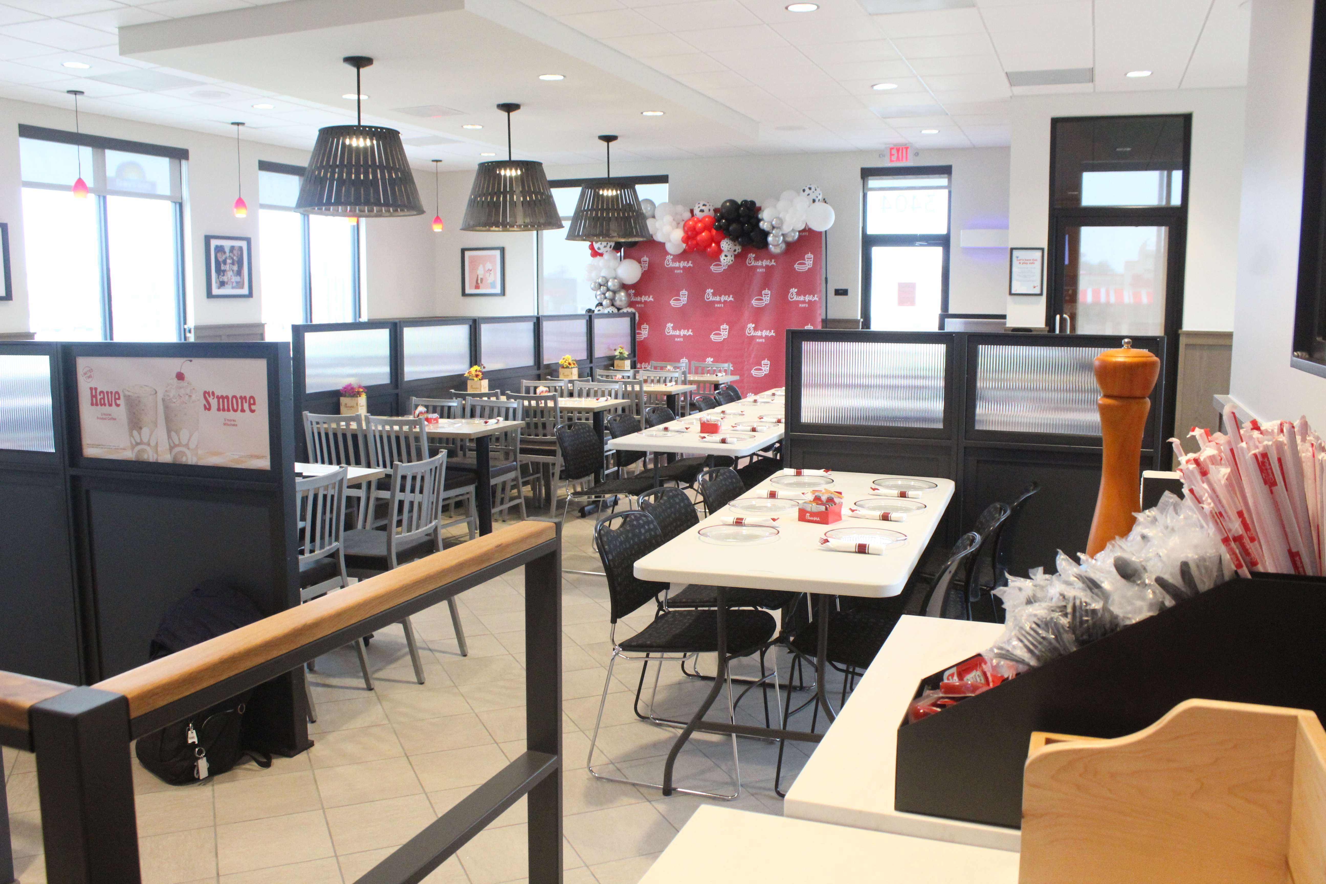 The Hays Chick-fil-A dining room set for a special pre-opening day dinner Wednesday night. The plates will be gone today, and the store is open to all diners. Photo by Cristina Janney/Hays Post
