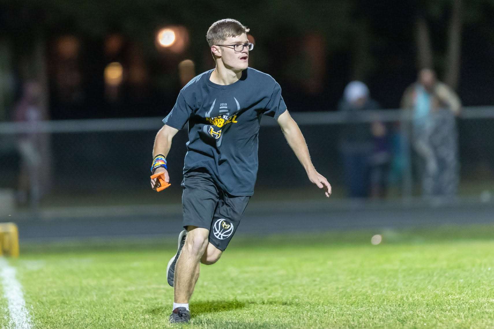 Garrett Reihs works on the sideline during his time as a student manager at Haven High School. The 2020 Haven graduate went on to Hutchinson Community College and Kansas State University before joining the New England Patriots' equipment staff. (Photo courtesy of Kristy Ehart Photography)