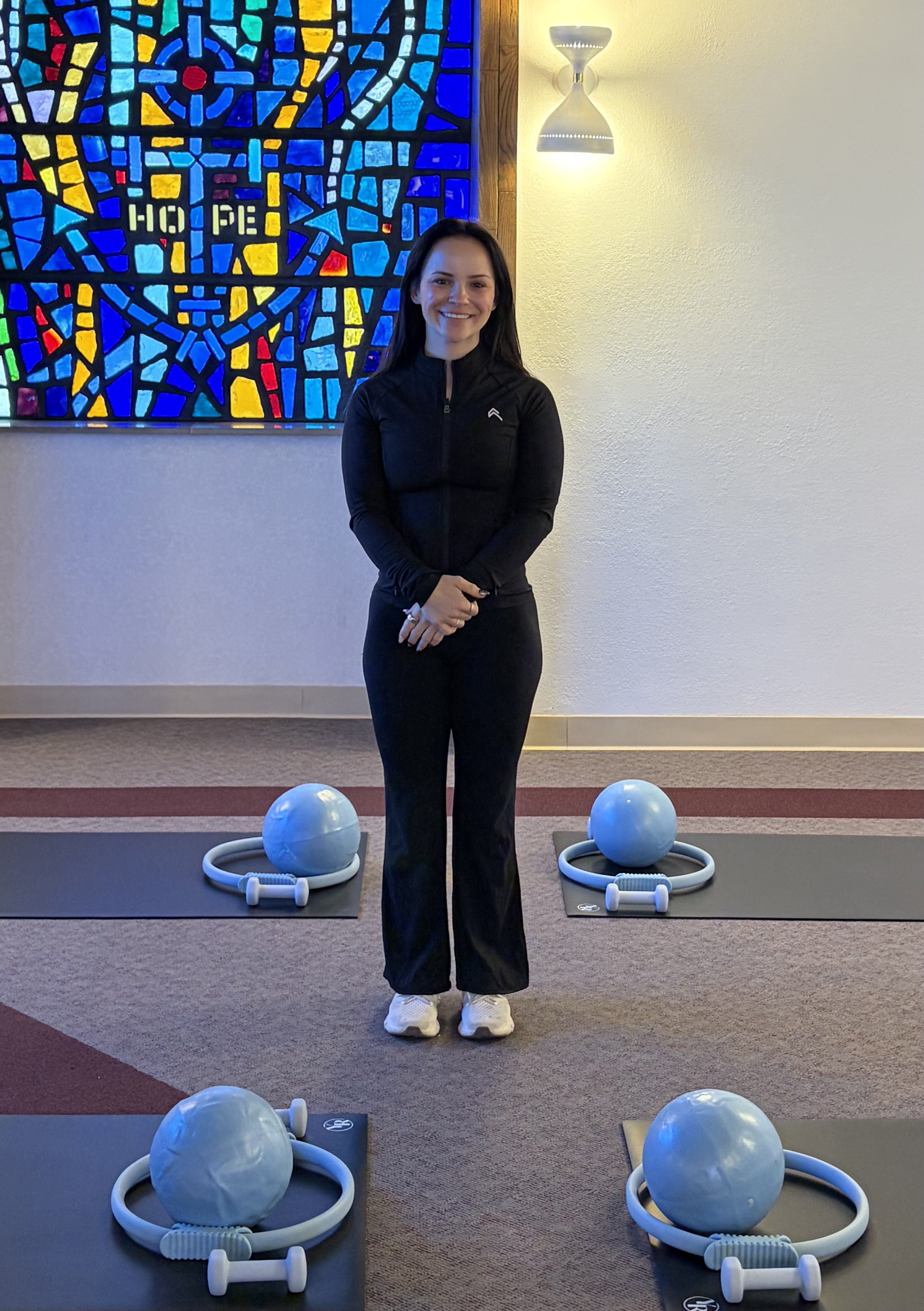 Isabelle Braun, Balanced Body Mat pilates instructor, poses for a picture inside her brand new pilates studio called&nbsp;Pilates &amp; Strength Studio by Isabelle. Photo by Alin Hett/Hays Post