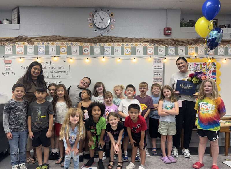 Classroom of kids with Jessica Ray (Photo courtesy Hutchinson Public Schools)